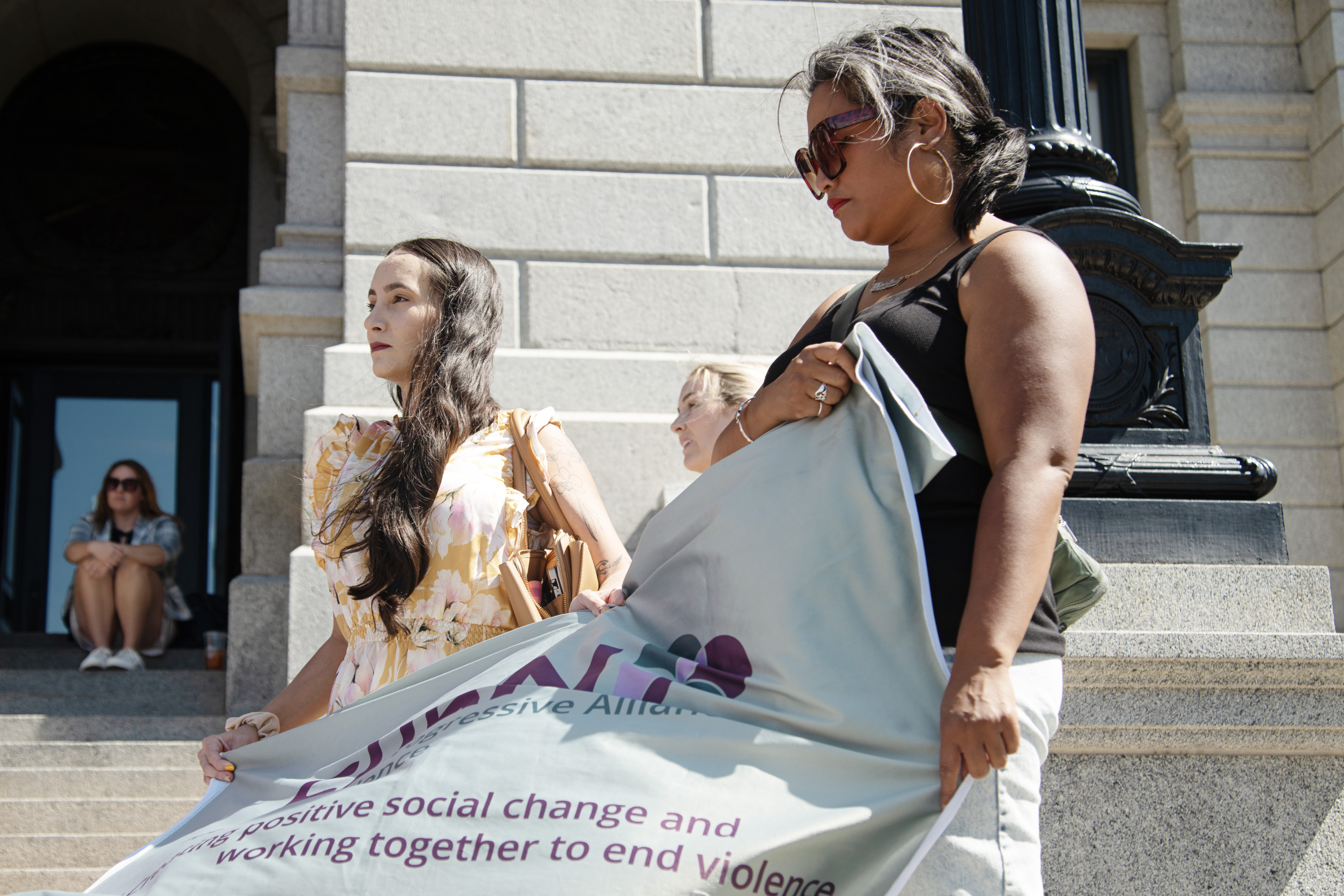 Romina Slossberg, left, and Christine Harrell hold a banner at a rally for Prop KK, a ballot initiative proposing a 6.5 percent excise tax on guns and ammunition in Colorado, rallied on the state capitol building's steps in Denver on Thursday, Sept. 12, 2024. Slossberg and Harrell work with Safehouse Progressive Alliance for Nonviolence (SPAN) an organization dedicated to providing care to domestic violence and abuse victims. (TomHellauerMultimedia Producertom.hellauer@denvergazette.comhttps://denvergazette.com/content/tncms/avatars/f/9e/622/f9e6228a-3b6b-11ed-bf10-fbb71fa8e421.f54b911252c540f1d61709edc4727a39.png)
