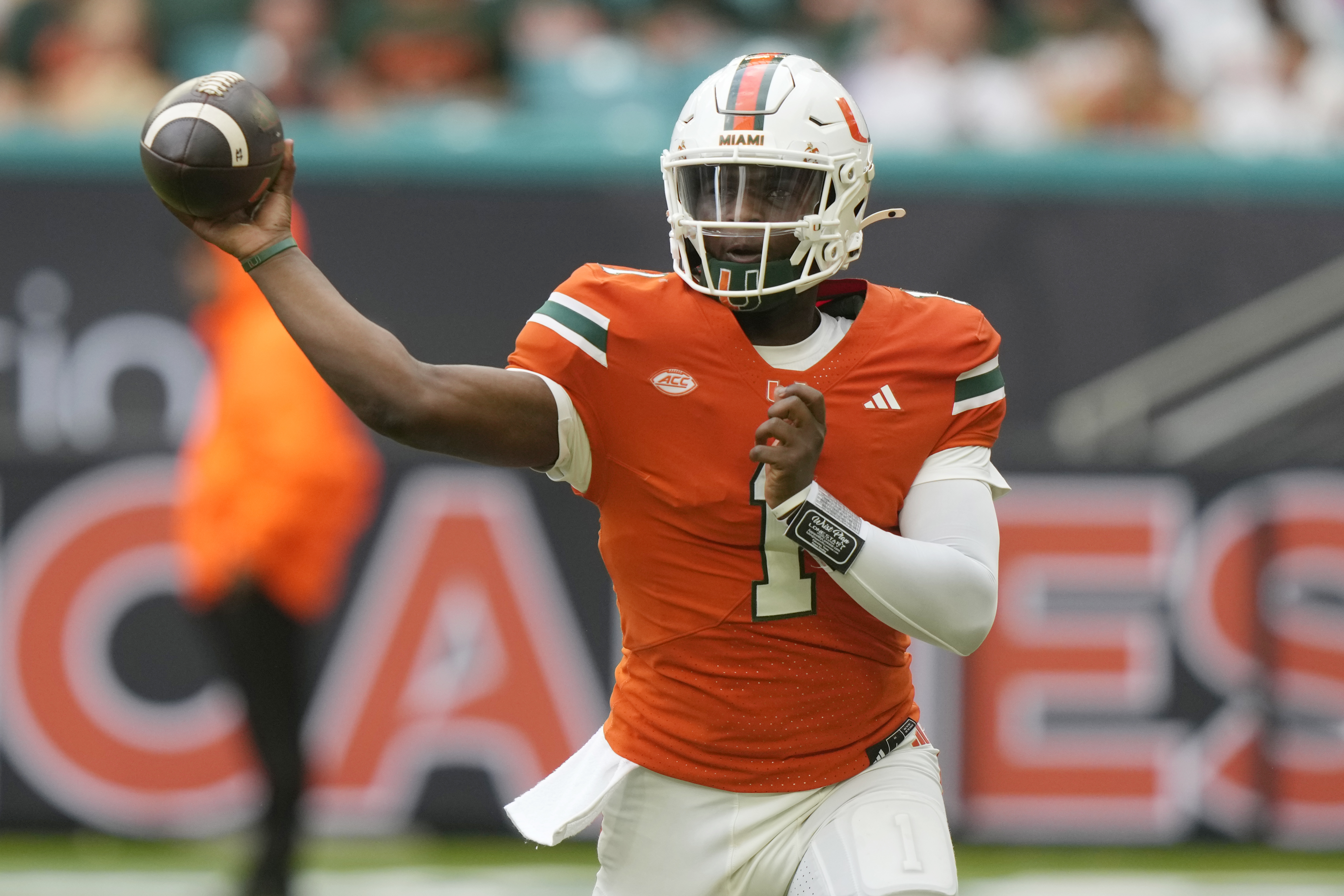 Miami quarterback Cam Ward (1) throws during the first half of an NCAA college football game against Ball State, Saturday, Sept. 14, 2024, in Miami Gardens, Fla. (AP Photo/Lynne Sladky) (Lynne Sladky)