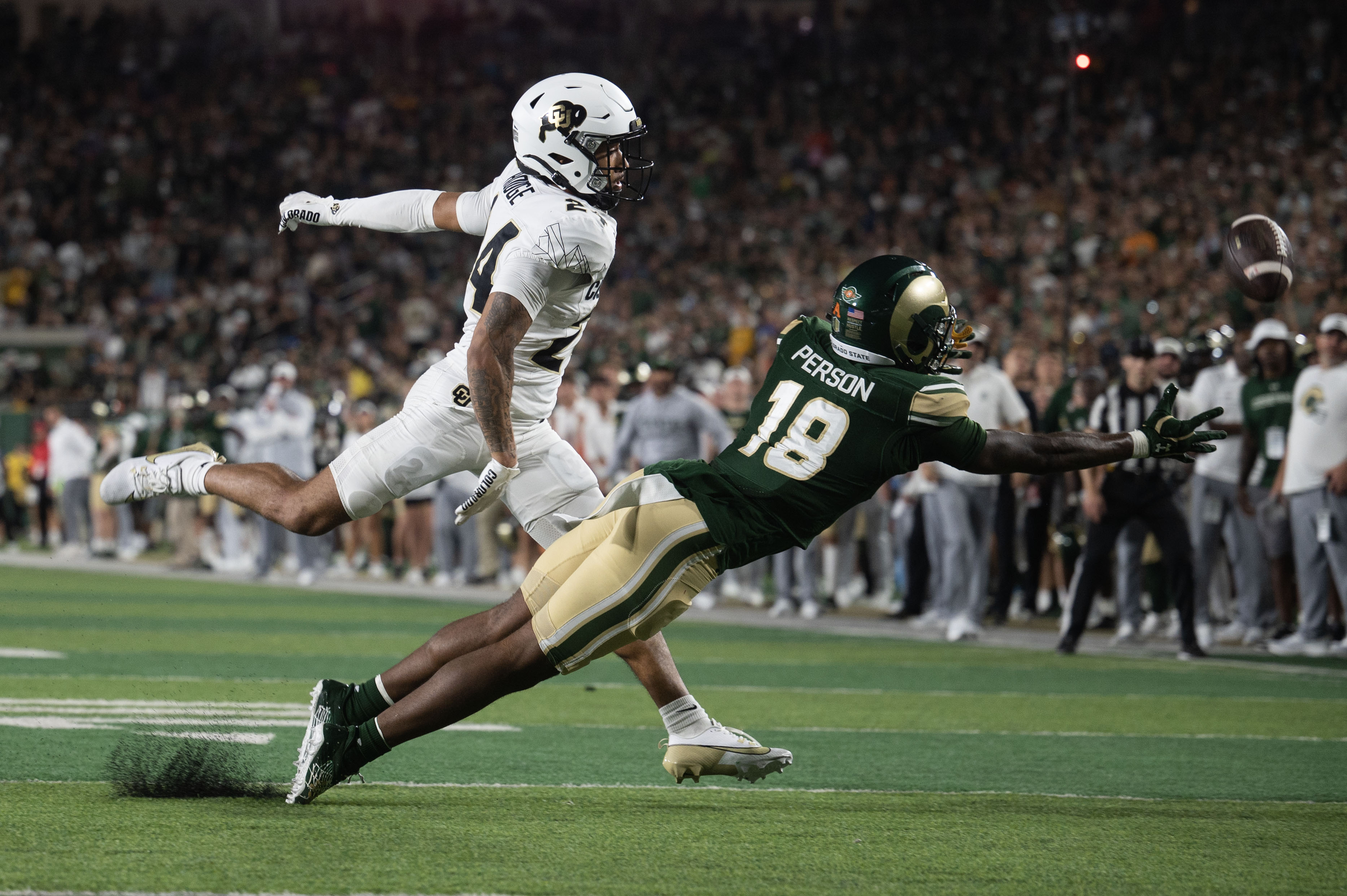 Colorado senior cornerback Preston Hodge (24) defends as Colorado State freshman wide receiver Jamari Person (18) dives for a catch in the second half of the Rocky Mountain Showdown on Saturday, Sept. 14, 2024 at Canvas Stadium in Fort Collins. (Stephen Swofford, the Denver Gazette)