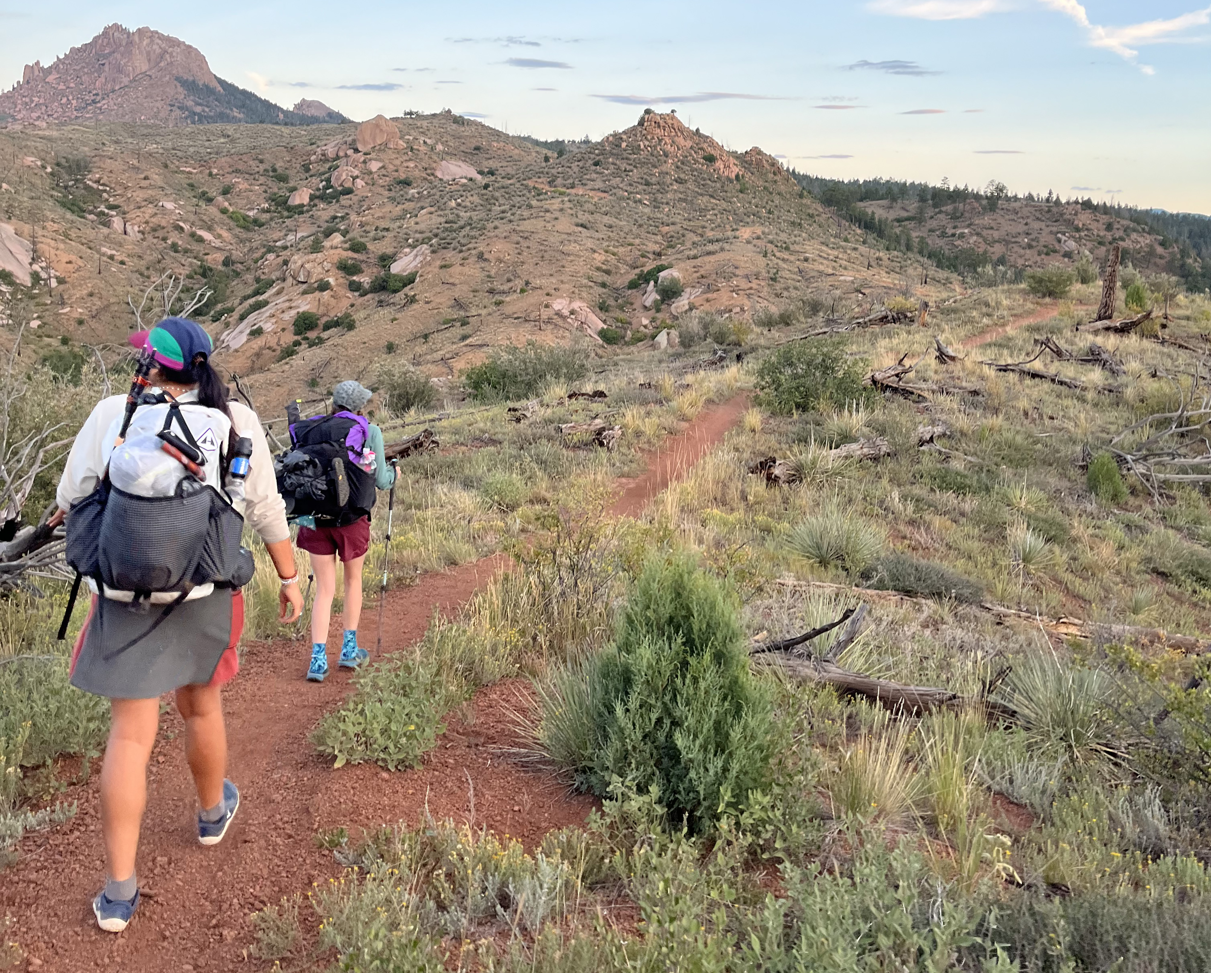 Sharii and Kyla Pearce walk through the Buffalo Creek fire burn scar along the Colorado Trail. (Ariella Nardizzi, Special to The Gazette)