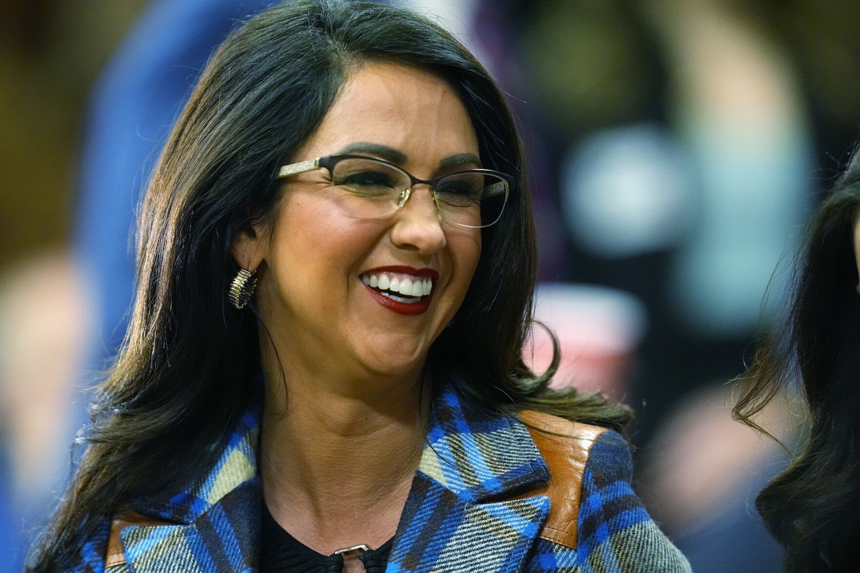 Republican U.S. Rep. Lauren Boebert talks with voters before a Jan. 25, 2024, primary debate for the Colorado congressional seat once held by former U.S. Rep. Ken Buck. ((AP Photo/David Zalubowski))