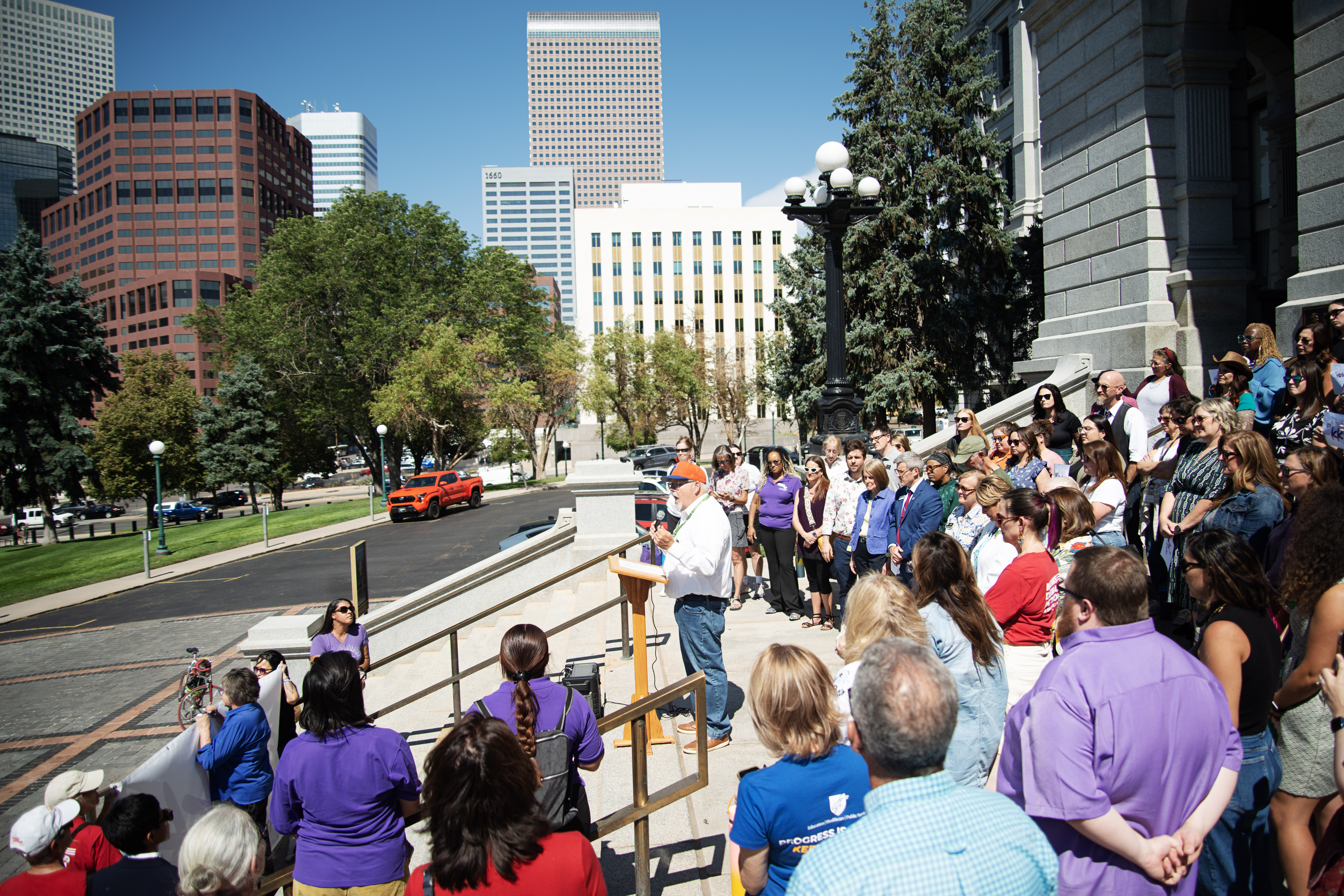 Colo. State Sen. Tom Sullivan speaks in favor of Prop KK, a ballot initiative proposing a 6.5 percent excise tax increase on guns and ammunition in Colorado, rallied on the state capitol building's steps in Denver on Thursday, Sept. 12, 2024. Sullivan's son was killed by a gunman in the 2012 Aurora theater shooting. 