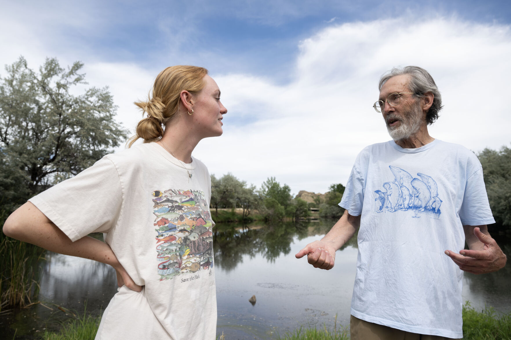 Lydia Kramer, left, talks with Jim Morris about how she came to be his director of digital marketing outside his T-shirt printing company on Wednesday, Aug. 21, 2024. (Stephen Swofford, Denver Gazette) (StephenSwoffordPhotographerstephen.swofford@gazette.comhttps://secure.gravatar.com/avatar/1ddcaf11c5d70eaa58546ddc4e038687?d=mm&r=g)