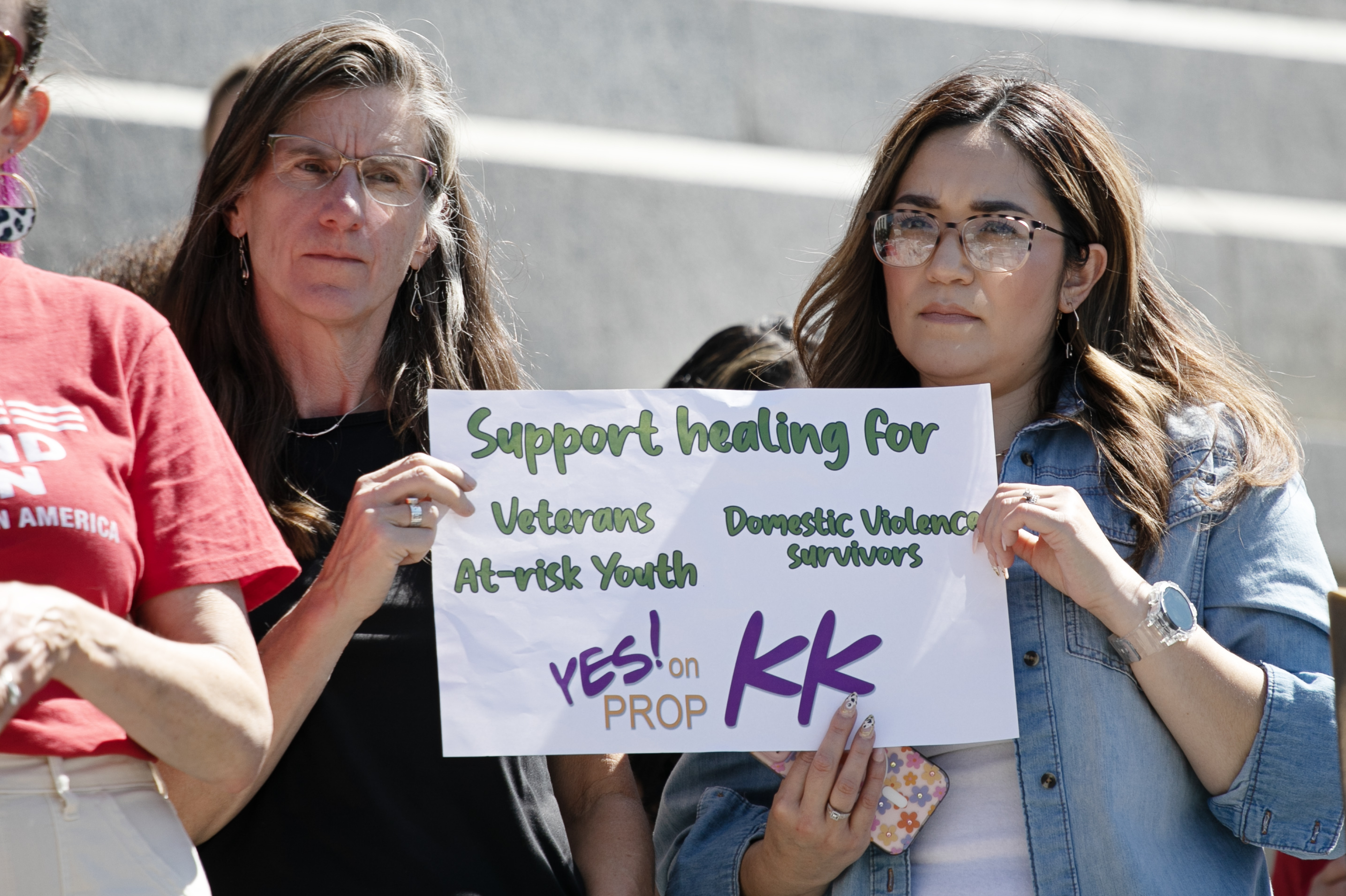 Proponents of Prop KK, a ballot initiative proposing a 6.5 percent tax increase on the sales of guns and ammunition in Colorado, hold up a sign on the state capitol building's steps during a press conference in Denver on Thursday, Sept. 12, 2024. (TomHellauerMultimedia Producertom.hellauer@denvergazette.comhttps://denvergazette.com/content/tncms/avatars/f/9e/622/f9e6228a-3b6b-11ed-bf10-fbb71fa8e421.f54b911252c540f1d61709edc4727a39.png)