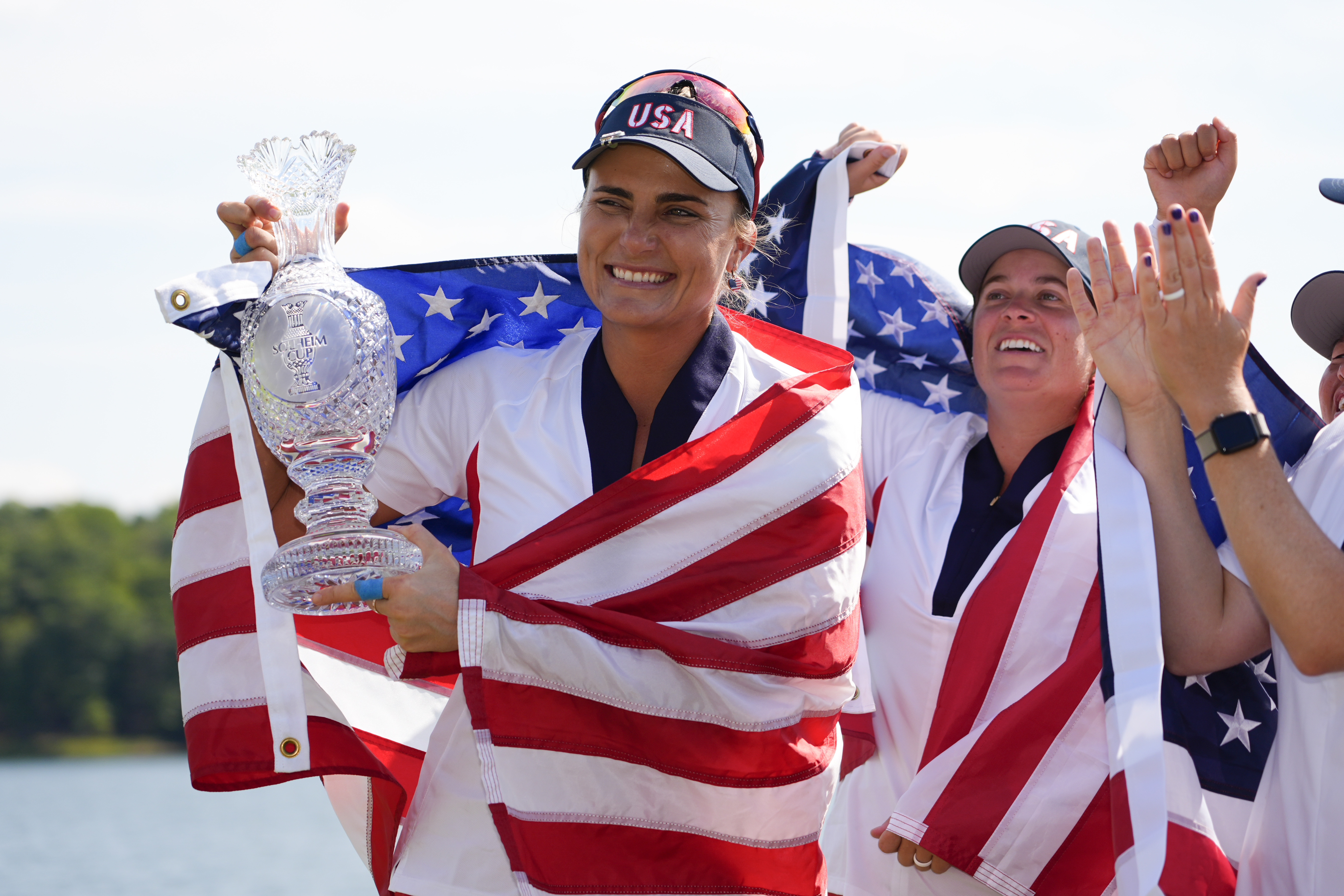 United States' Lexi Thompson holds the winner's trophy after the United States won the Solheim Cup golf tournament against Europe at the Robert Trent Jones Golf Club, Sunday, Sept. 15, 2024, in Gainesville, Va. (AP Photo/Matt York) (Matt York)