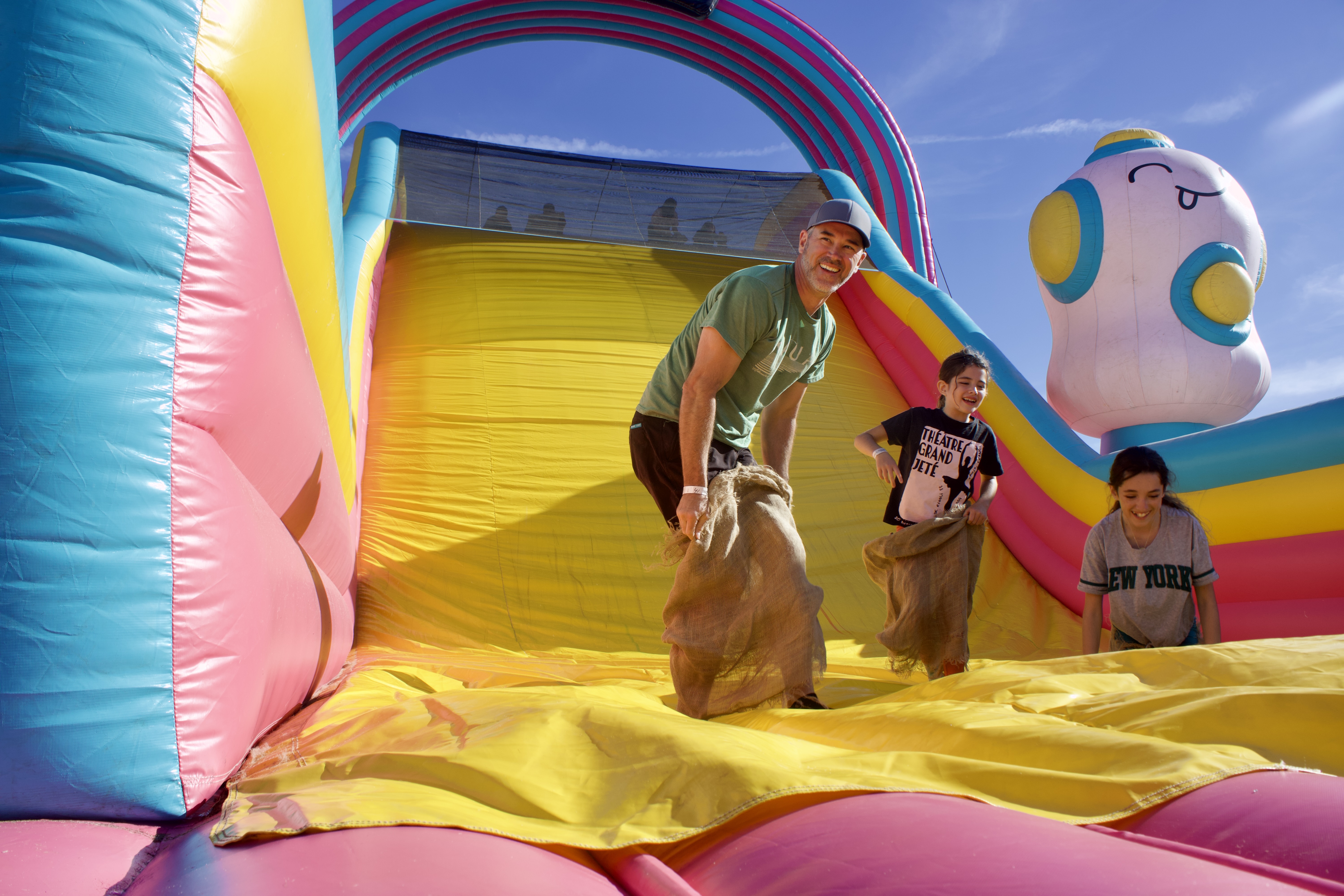 Mike Weldon, with his two daughters Adella and Mila, after sliding down the largest inflatable slide at the Big Bounce America Tour at the new National Western Center on Sunday, Sept. 22 in Denver, Colorado. (NoahFestensteinCity Government Reporternoah.festenstein@denvergazette.comhttps://denvergazette.com/content/tncms/avatars/9/f0/326/9f032698-379f-11ee-8053-8bacbed4931f.60984dba383441d9647e0e740a08a8e6.png)