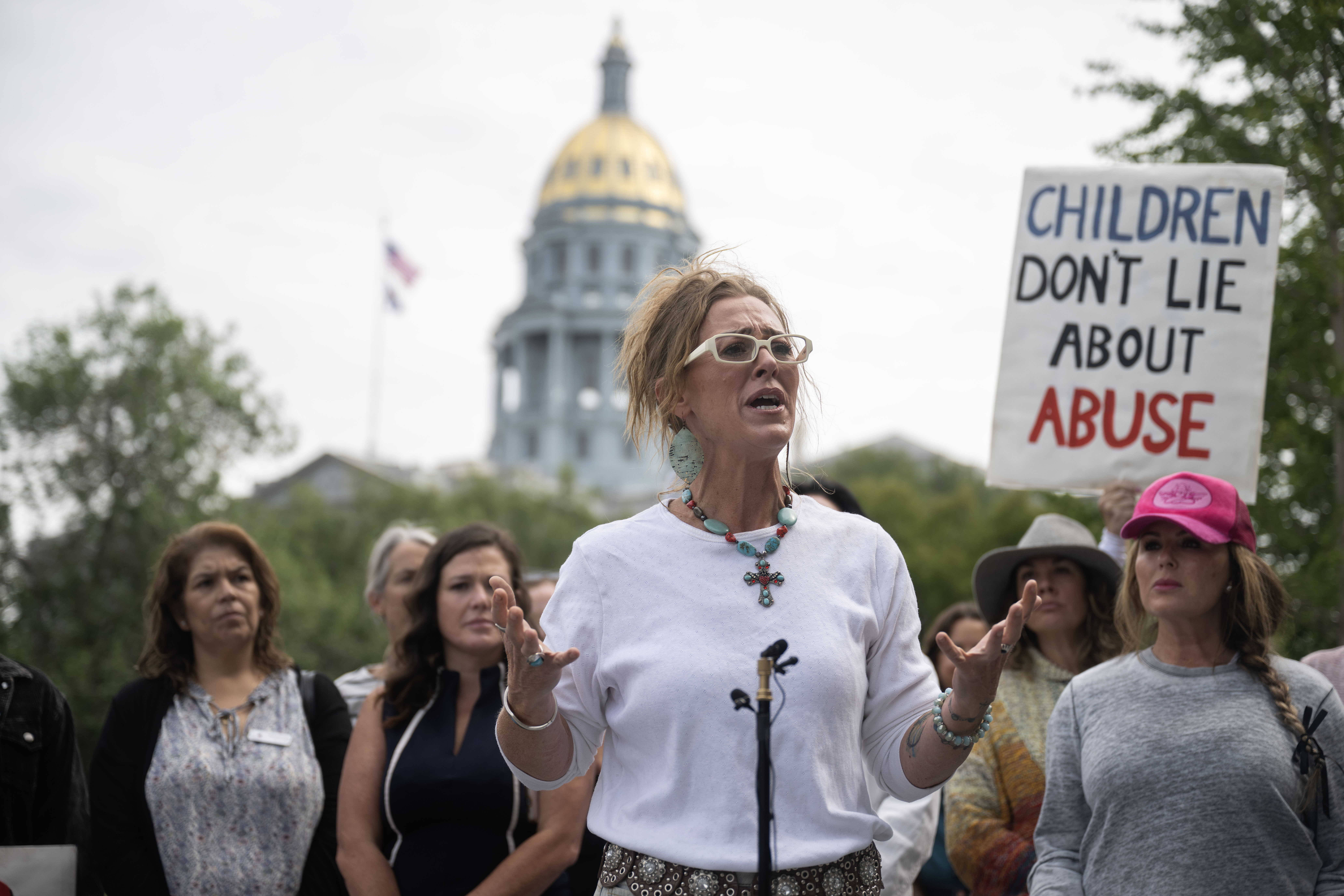 Rachel Pickrel-Hawkins addresses the media during a rally calling for family court reforms outside the Ralph L. Carr Colorado Justice Center in Denver on Thursday, Sept. 5, 2024. Pickrel-Hawkins was jailed for opposing reunification therapy between her two youngest sons and her ex-husband, who is facing multiple criminal charges of sexually and physically abusing their children, according to a press release. (Stephen Swofford, Denver Gazette) (Stephen Swofford Denver Gazette)