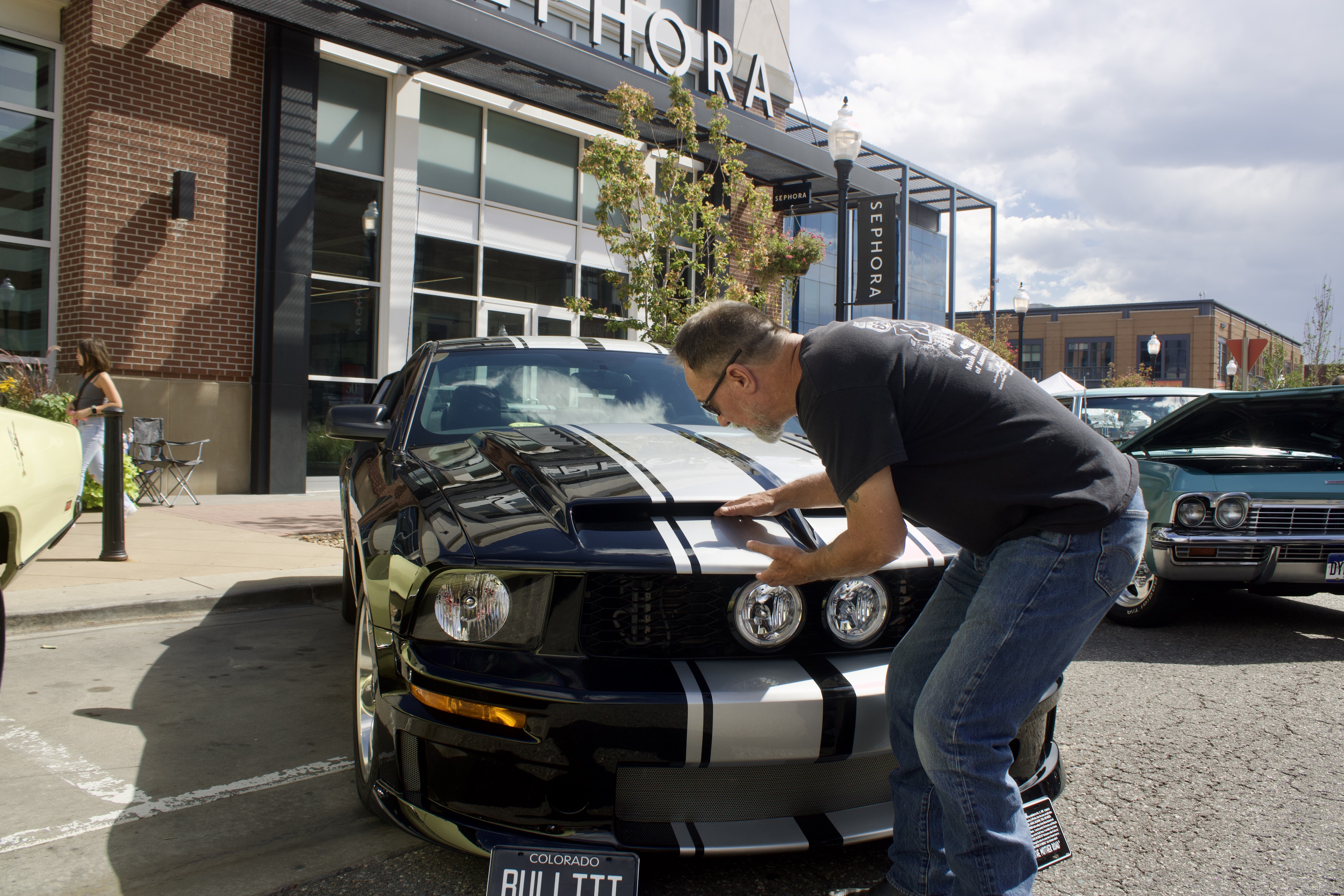 Steve McQueen checks the hood of his 2005 Ford Mustang GT during the fifth annual Rocky Mountain Rods and Rides Car Show on Sunday, Sept. 15 at The Shops at Northfield in Denver, Colorado. (NoahFestensteinCity Government Reporternoah.festenstein@denvergazette.comhttps://denvergazette.com/content/tncms/avatars/9/f0/326/9f032698-379f-11ee-8053-8bacbed4931f.60984dba383441d9647e0e740a08a8e6.png)