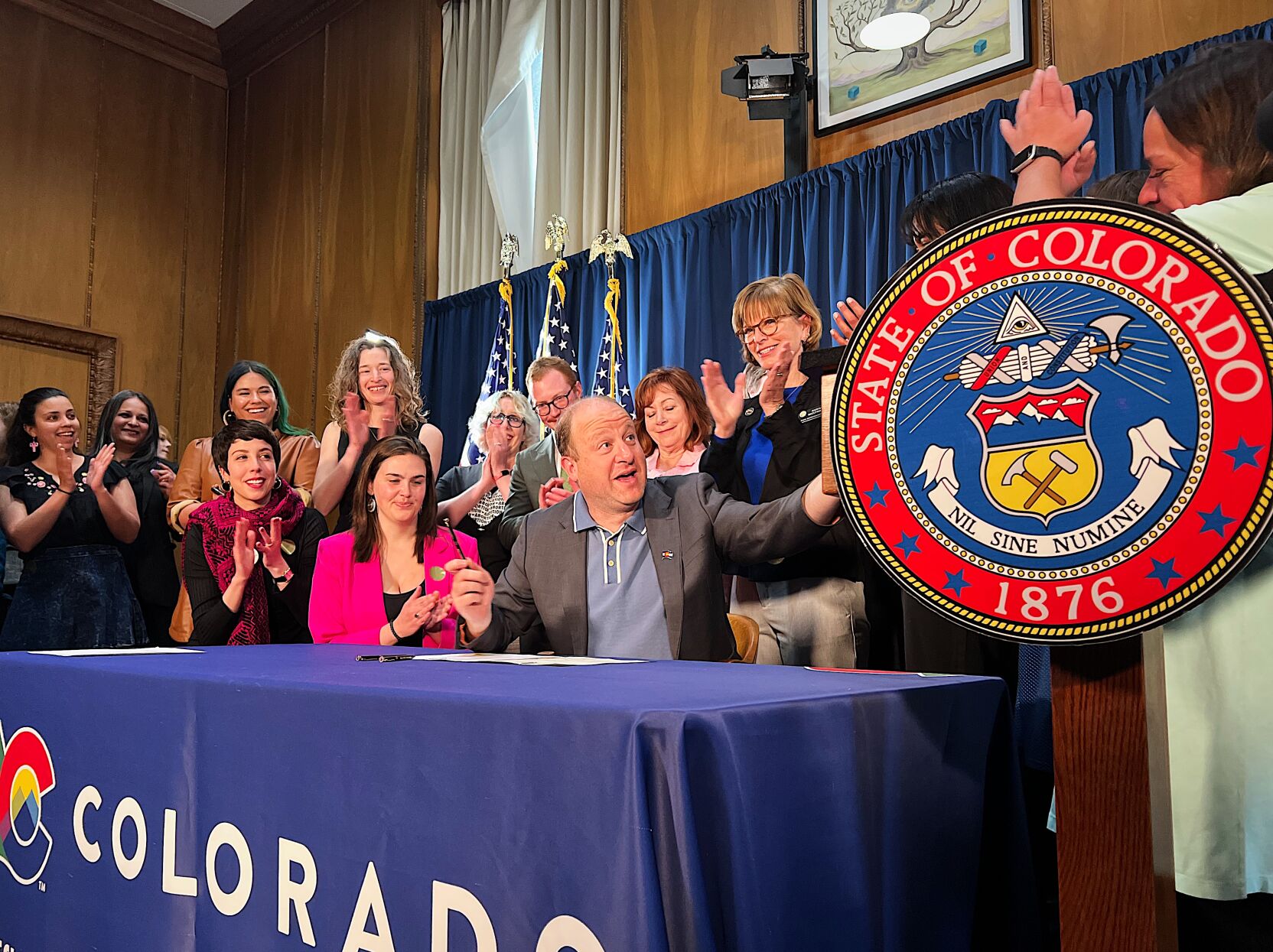 Gov. Jared Polis celebrates with bill sponsors and advocates after signing Senate Bill 190 into law, part of a trio of legislation seeking to bolster abortion rights, on Friday, April 14, 2023. (hannah.metzger@gazette.comhttps://secure.gravatar.com/avatar/ab755d481c23353a8e65af50db4c03b9?d=mm&r=g)