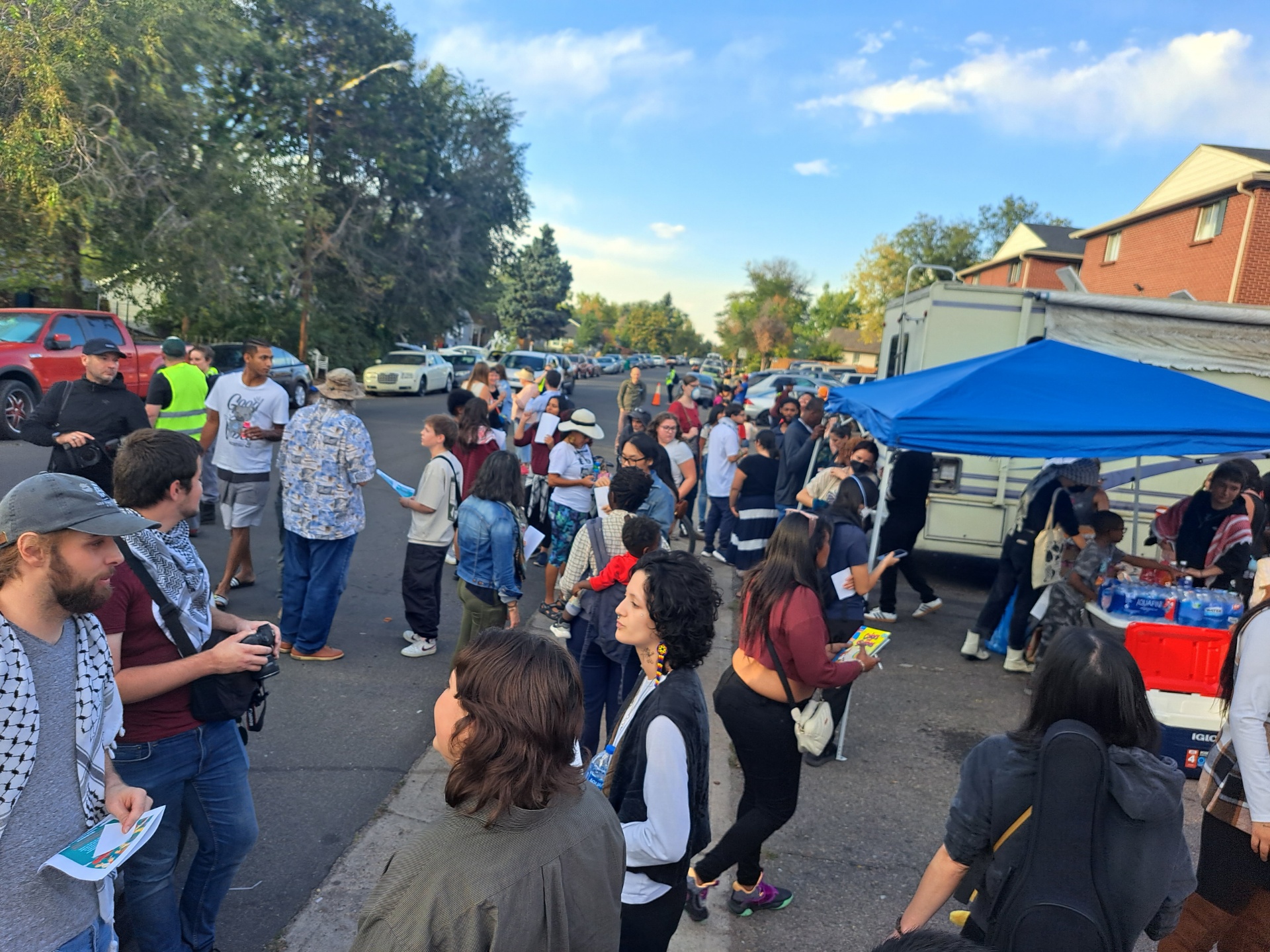 As Friday's Trump rally wound up, various advocacy groups held a barbecue for neighbors near The Edge at Lowry apartments to show that 