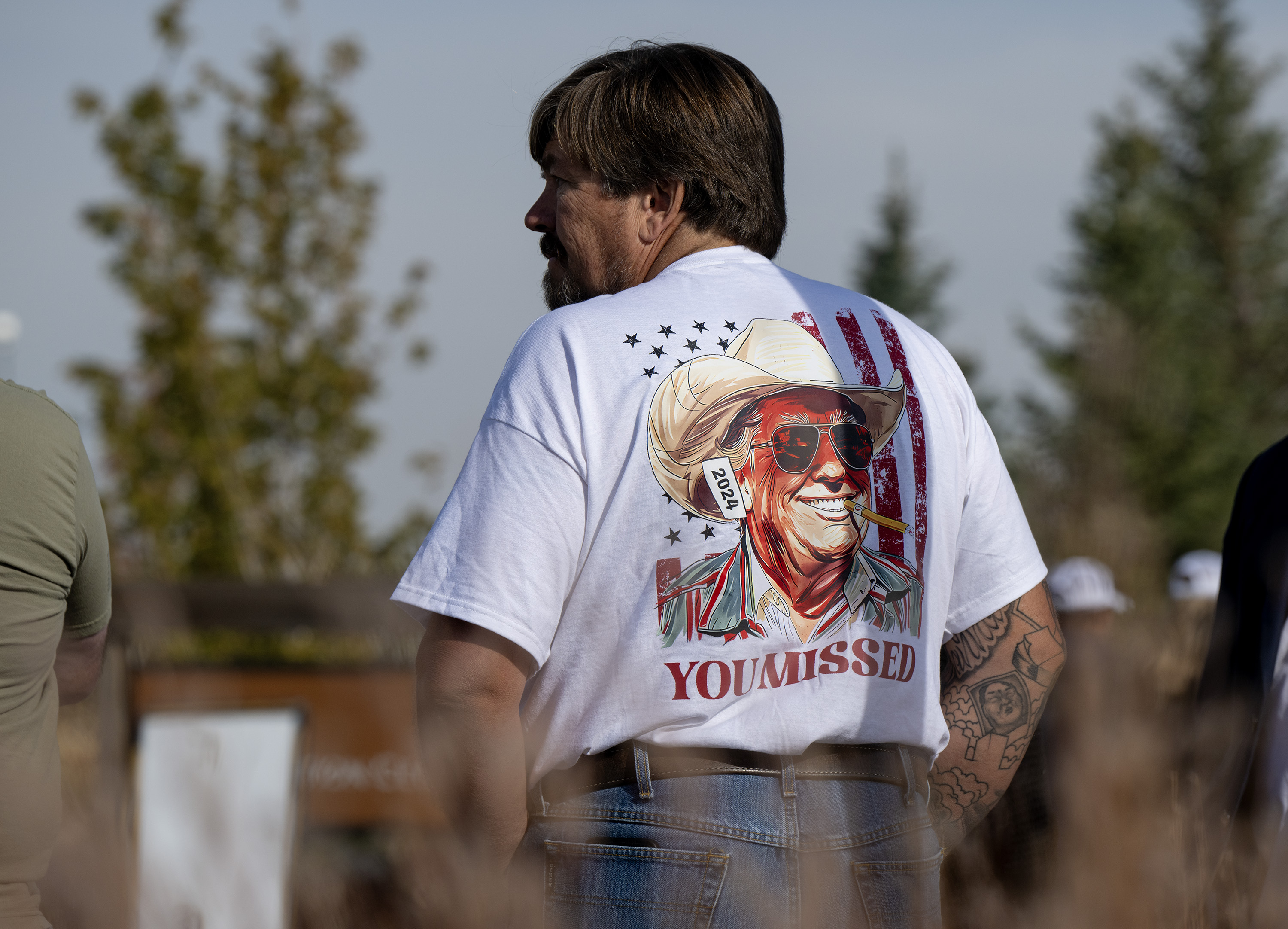 A Trump supporter waits in line for his campaign rally at the Gaylord Rockies Resort and Convention Center, Friday, Oct. 11, 2024, in Aurora, Colo. (Parker Seibold, The Gazette) (Parker Seibold, The Gazette)