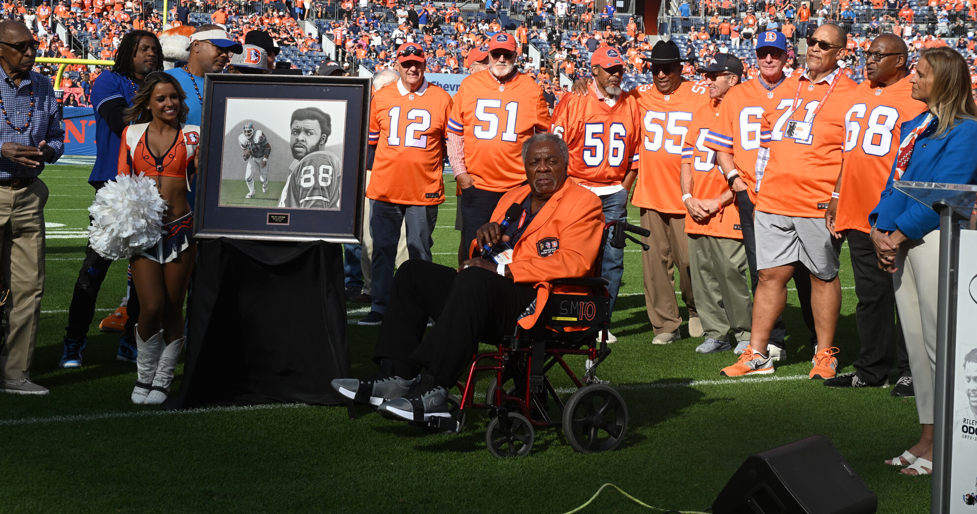 Many members of the ’77 Broncos team, the first Broncos team to go to the Super Bowl, were on hand to see two of their own to be added to the Broncos Ring of Fame. One of the names added was Riley Odoms (foreground) at Empower Field at Mile High on Sunday, Oct. 6, 2024. (Jerilee Bennett, The Gazette)