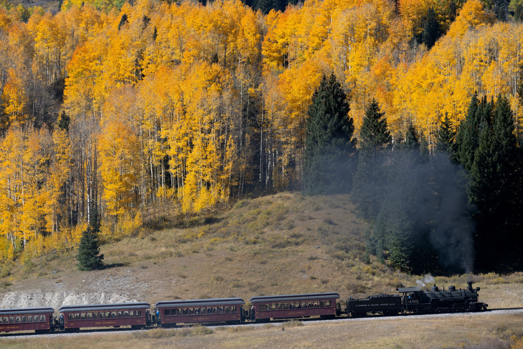 The Cumbres and Toltec Scenic Railroad climbs Cumbres Pass from Chama, N.M., to Antonito through the turning aspens last week. The railroad was started by Colorado Springs founder Gen. Willam Jackson Palmer in 1882. (Christian Murdock, The Gazette)