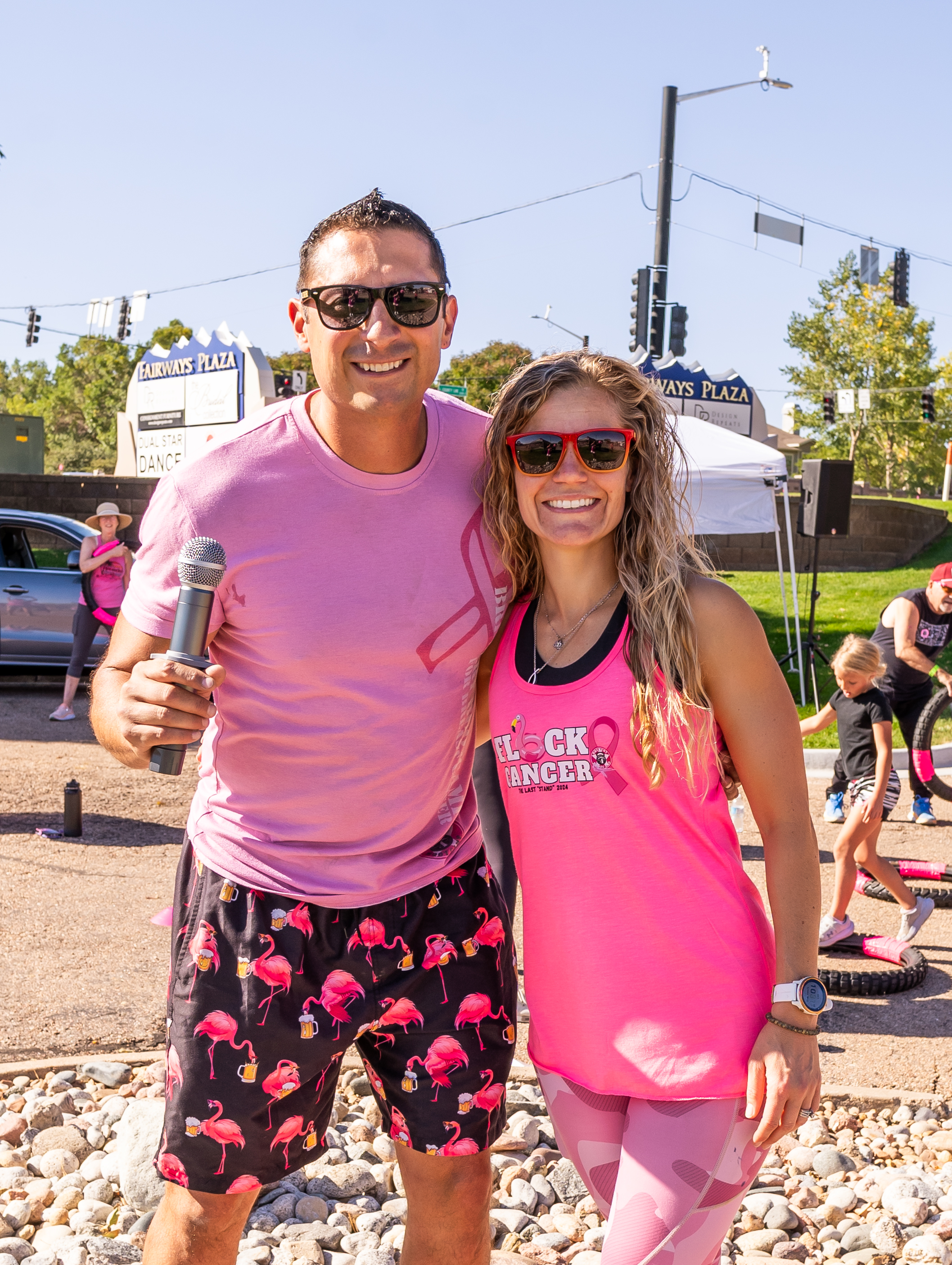 Paul and Lindsay Chavez, co-founders of the Brewery Boot Camp for Breast Cancer 2024, in a Centennial parking lot Oct. 5, 2024. Brewery Boot Camp workouts will continue at metro Denver area breweries, despite this being the final year for the annual fundraiser. (Courtesy photo, Sunfire Photos)