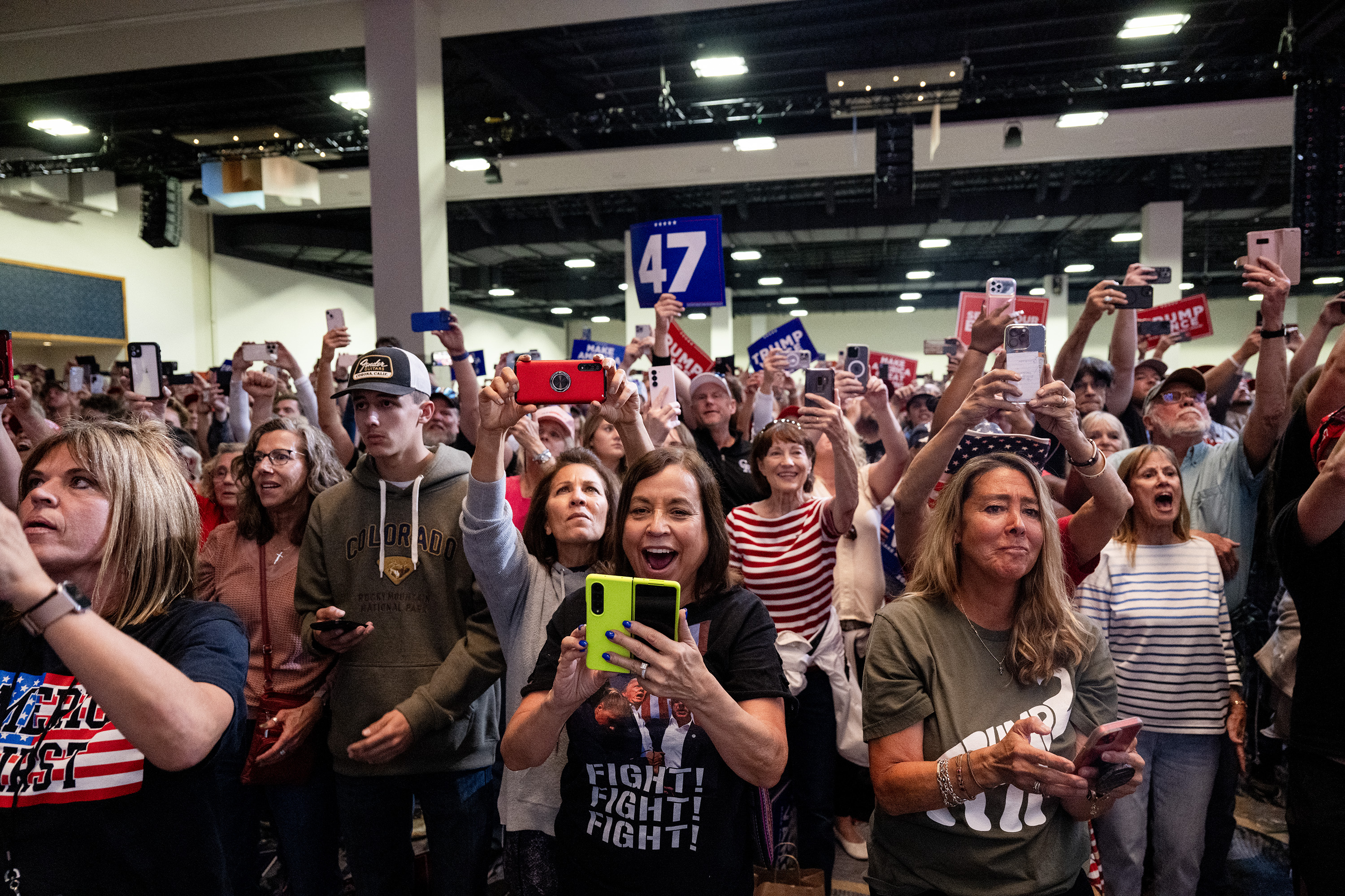 Fans cheer as Republican presidential nominee former President Donald Trump enters his campaign rally at the Gaylord Rockies Resort and Convention Center, Friday, Oct. 11, 2024, in Aurora, Colo. (Parker Seibold, The Gazette) (Parker Seibold, The Gazette)