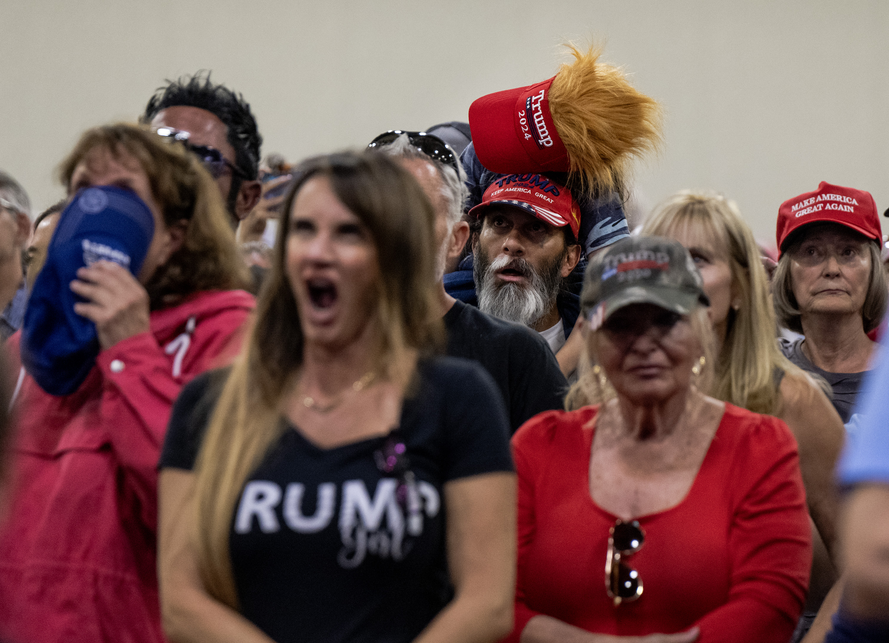 People watch as Republican presidential nominee former President Donald Trump’s remarks nears an hour-and-a-half during a campaign rally at the Gaylord Rockies Resort and Convention Center, Friday, Oct. 11, 2024, in Aurora, Colo. (Parker Seibold, The Gazette) (Parker Seibold, The Gazette)