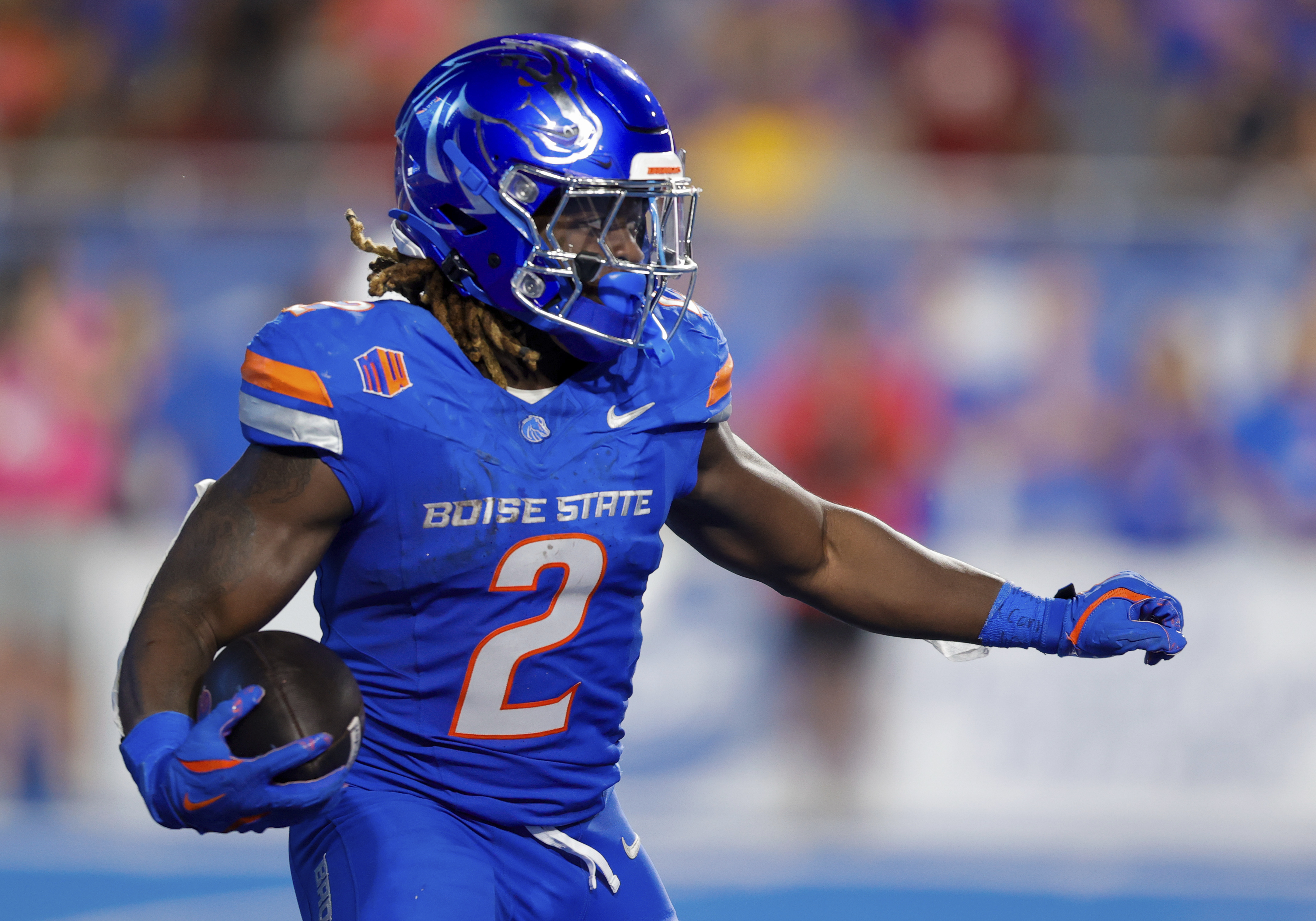 Boise State running back Ashton Jeanty (2) runs with the ball against Washington State in the second half of an NCAA college football game, Saturday, Sept. 28, 2024, in Boise, Idaho. Boise State won 45-25. (AP Photo/Steve Conner) (Steve Conner)