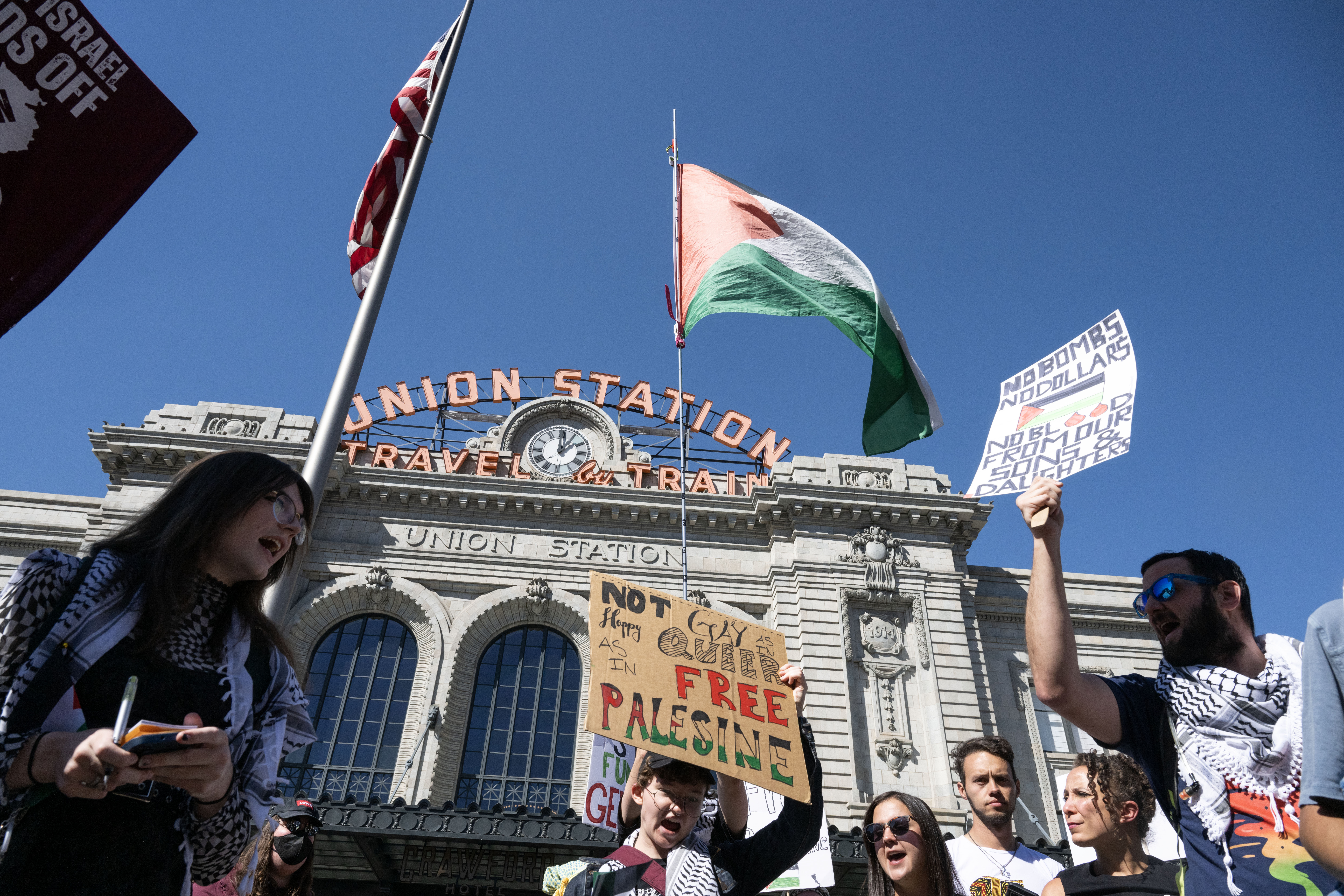 Protesters march through downtown Denver calling for divestment from Israel and an end to the conflict in Palestine on Monday, Oct. 7, 2024 (Stephen Swofford, Denver Gazette) (StephenSwoffordPhotographerstephen.swofford@gazette.comhttps://secure.gravatar.com/avatar/1ddcaf11c5d70eaa58546ddc4e038687?d=mm&r=g)