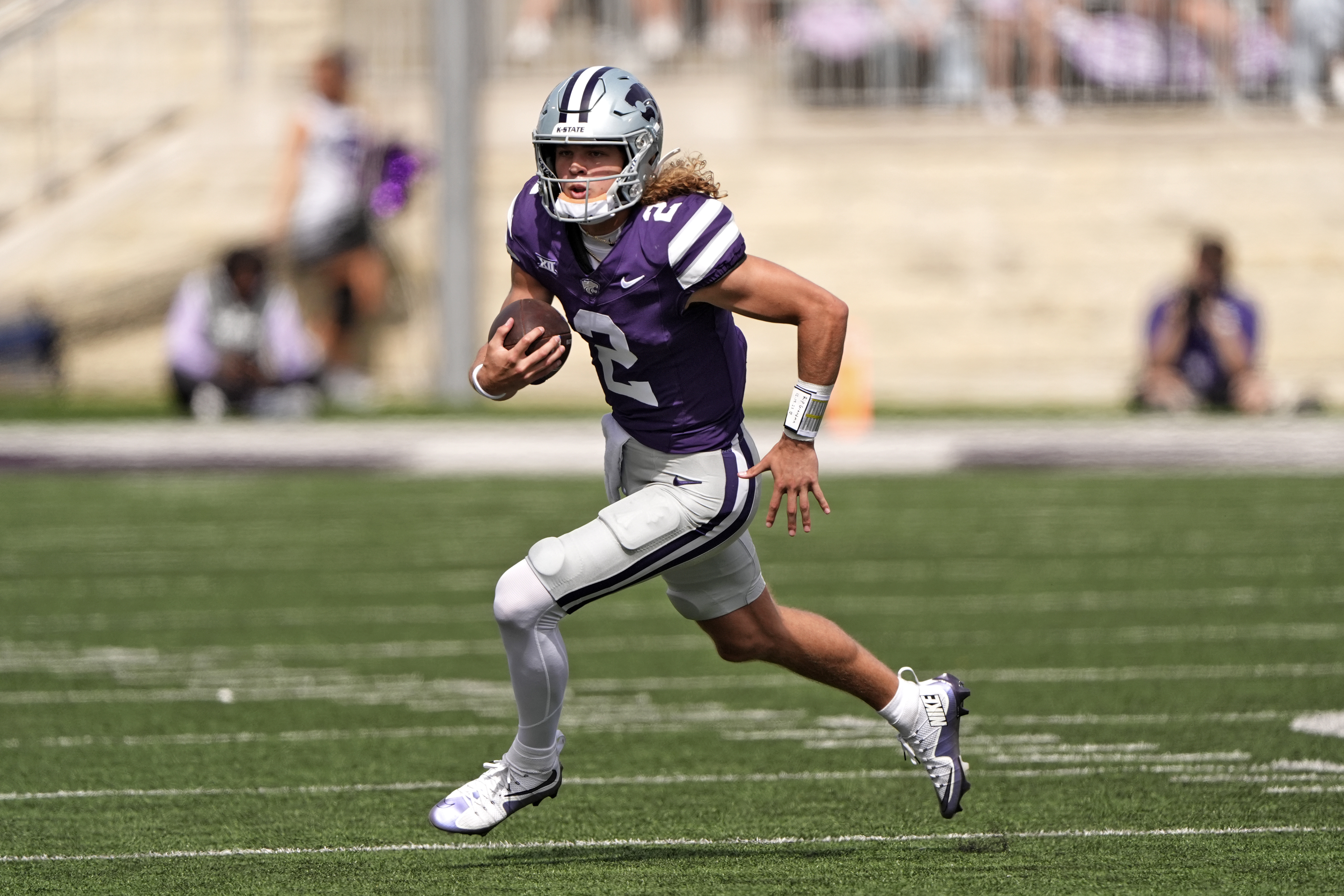 Kansas State quarterback Avery Johnson runs the ball during the second half of an NCAA college football game against Oklahoma State Saturday, Sept. 28, 2024, in Manhattan, Kan. (AP Photo/Charlie Riedel) (Charlie Riedel)