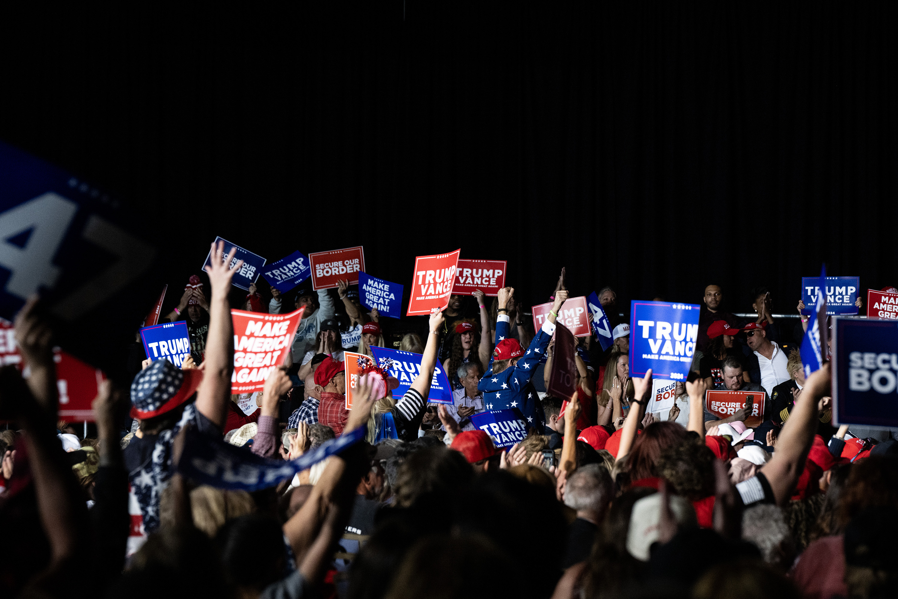 People cheer as candidates speak during a Trump campaign rally at the Gaylord Rockies Resort and Convention Center, Friday, Oct. 11, 2024, in Aurora, Colo. (Parker Seibold, The Gazette) (Parker Seibold, The Gazette)