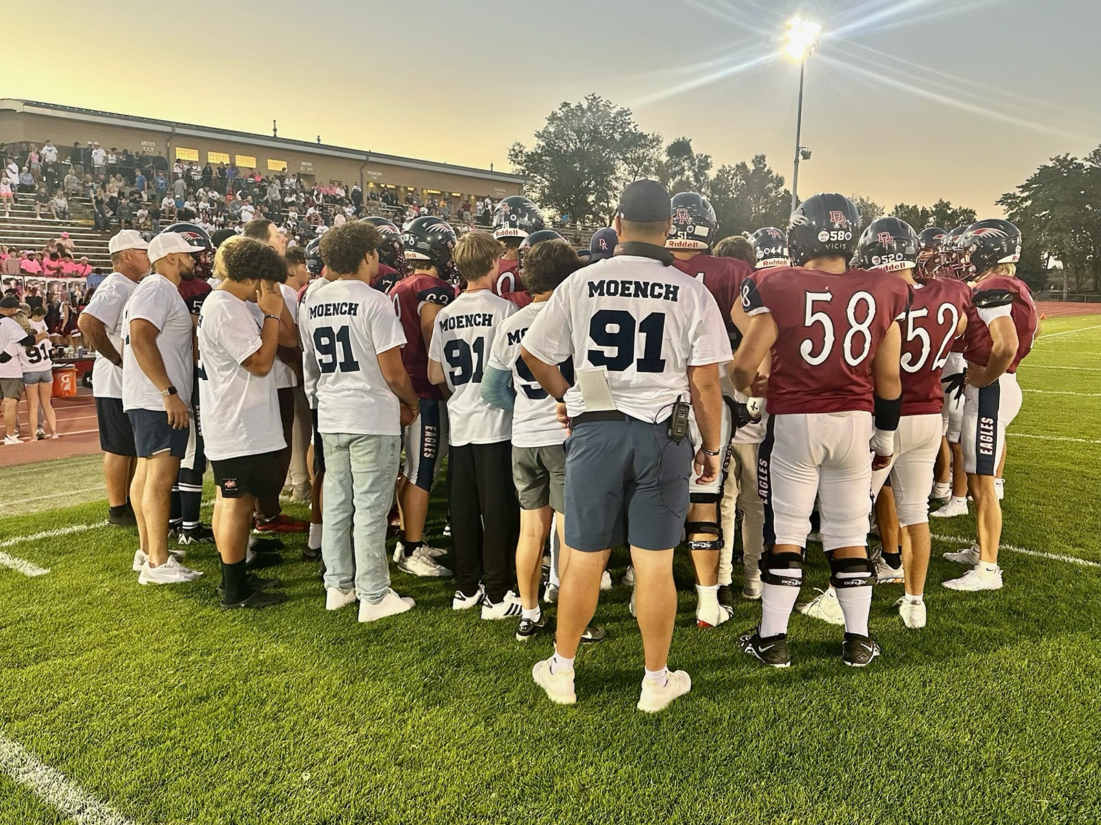 The Dakota Ridge High School football team wore colors and jerseys in honor of Walker Moench, a former player who died in a dirt bike crash, during their game against Cherokee Trail High School on Sept. 27, 2024. (Courtesy photo, Matt Heckel)