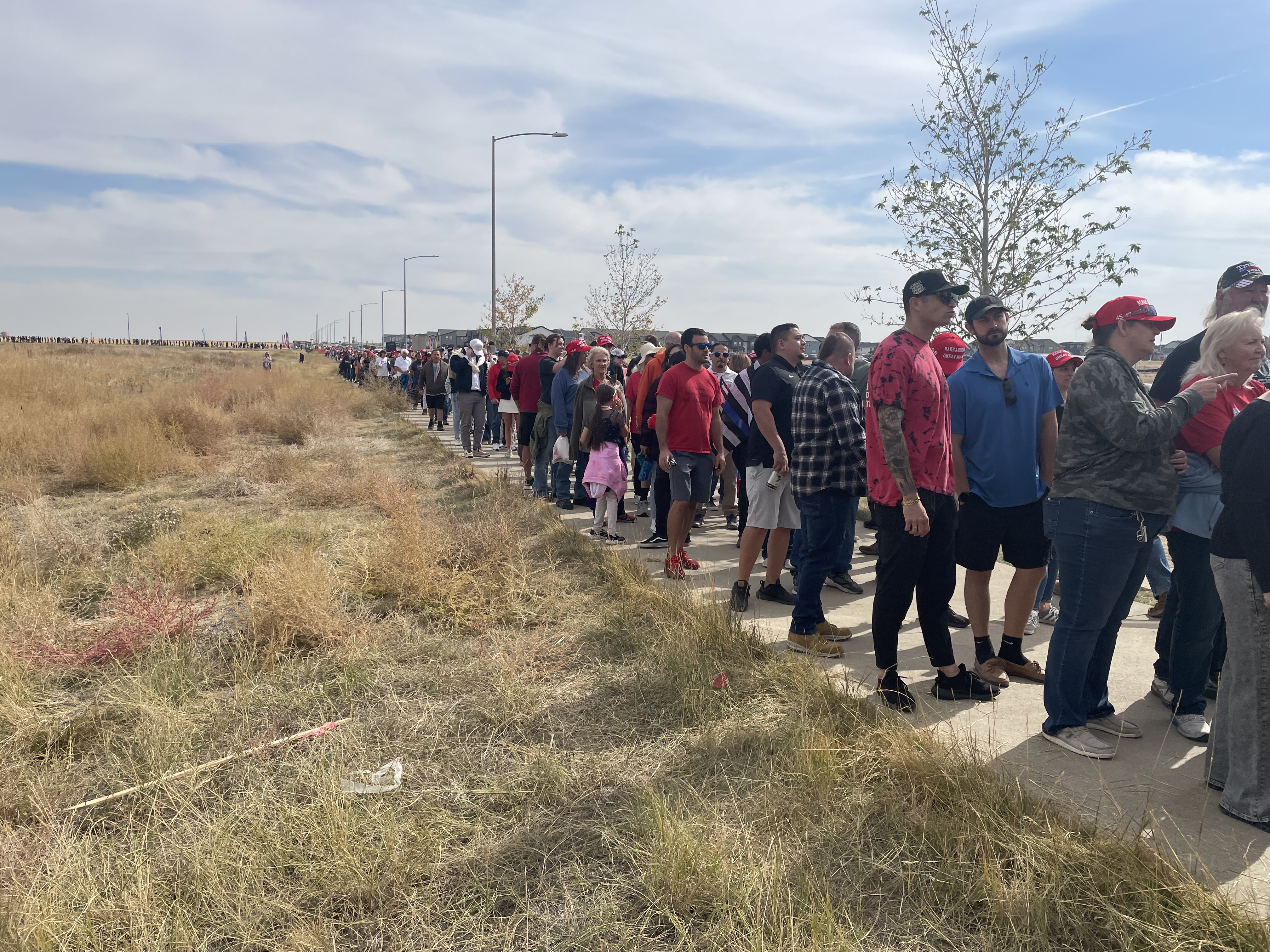 The line south down East 64th Avenue to get into former President Donald Trump's rally at the Gaylord Resort and Conference Center in Aurora stretched for blocks. People wore t-shirts, hats and carried flags in support of the former president. (CarolMcKinleyDenver Enterprise Reportercarol.mckinley@gazette.comhttps://denvergazette.com/content/tncms/avatars/5/c3/a0f/5c3a0fbe-1007-11ec-9e18-b7f42cfa4b0f.9565a0ce58866e86bcf18260621c2a46.png)