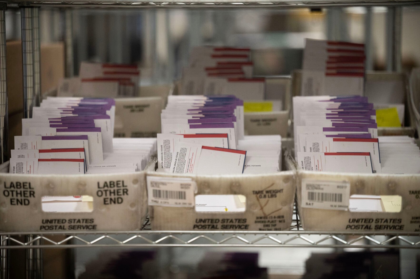 Mail-in ballots lie in stacks at the Denver elections office on Wednesday, Oct. 2, 2024 as they are prepared to be sent out for the upcoming presidential election. (Stephen Swofford, Denver Gazette) (StephenSwoffordPhotographerstephen.swofford@gazette.comhttps://secure.gravatar.com/avatar/1ddcaf11c5d70eaa58546ddc4e038687?d=mm&r=g)