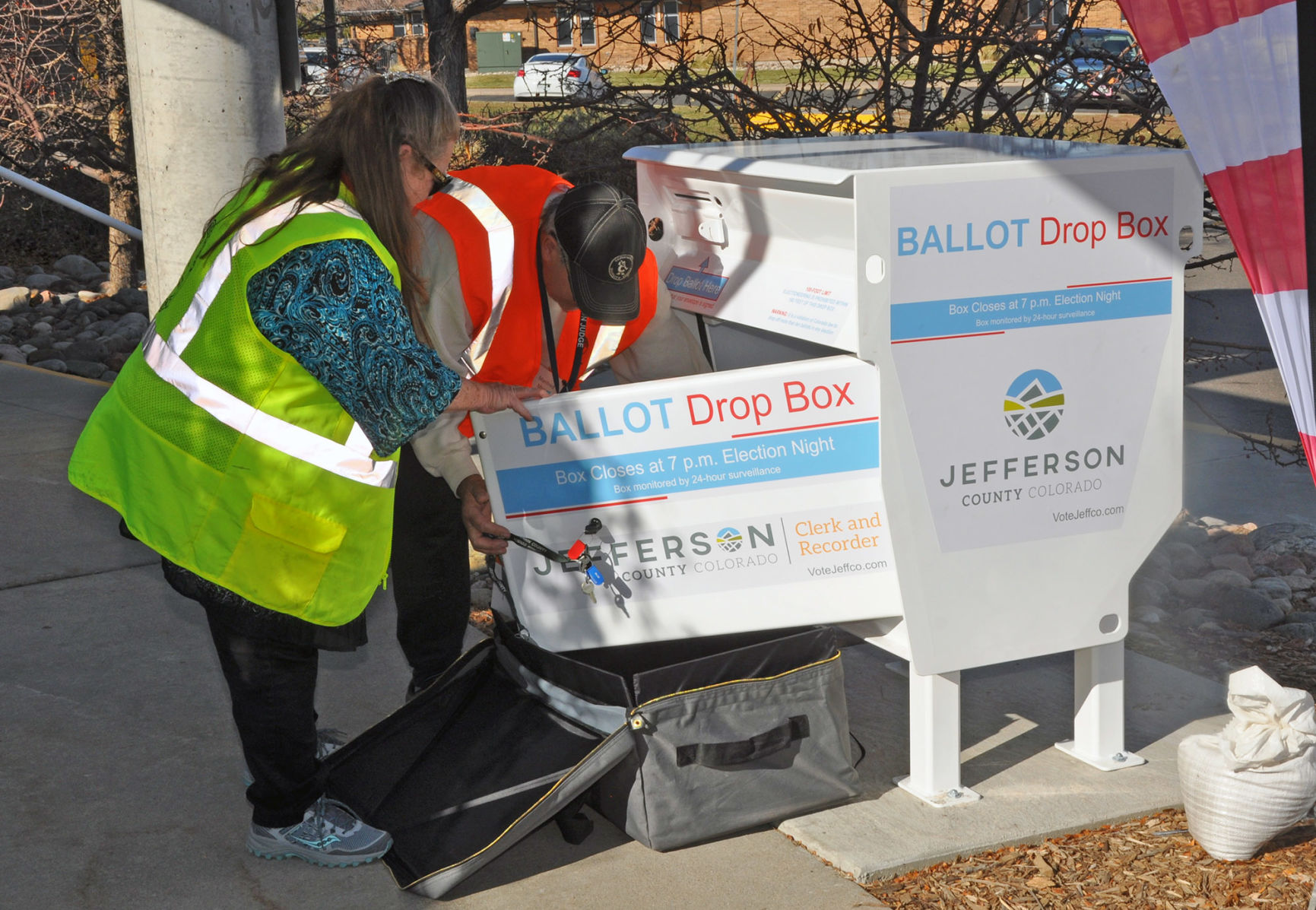 In this file photo, Jefferson County election workers collect ballots on Nov. 5, 2019, at a 24-hour drop box outside Green Mountain Recreation Center in Lakewood. ((Ernest Luning/Colorado Politics, file))