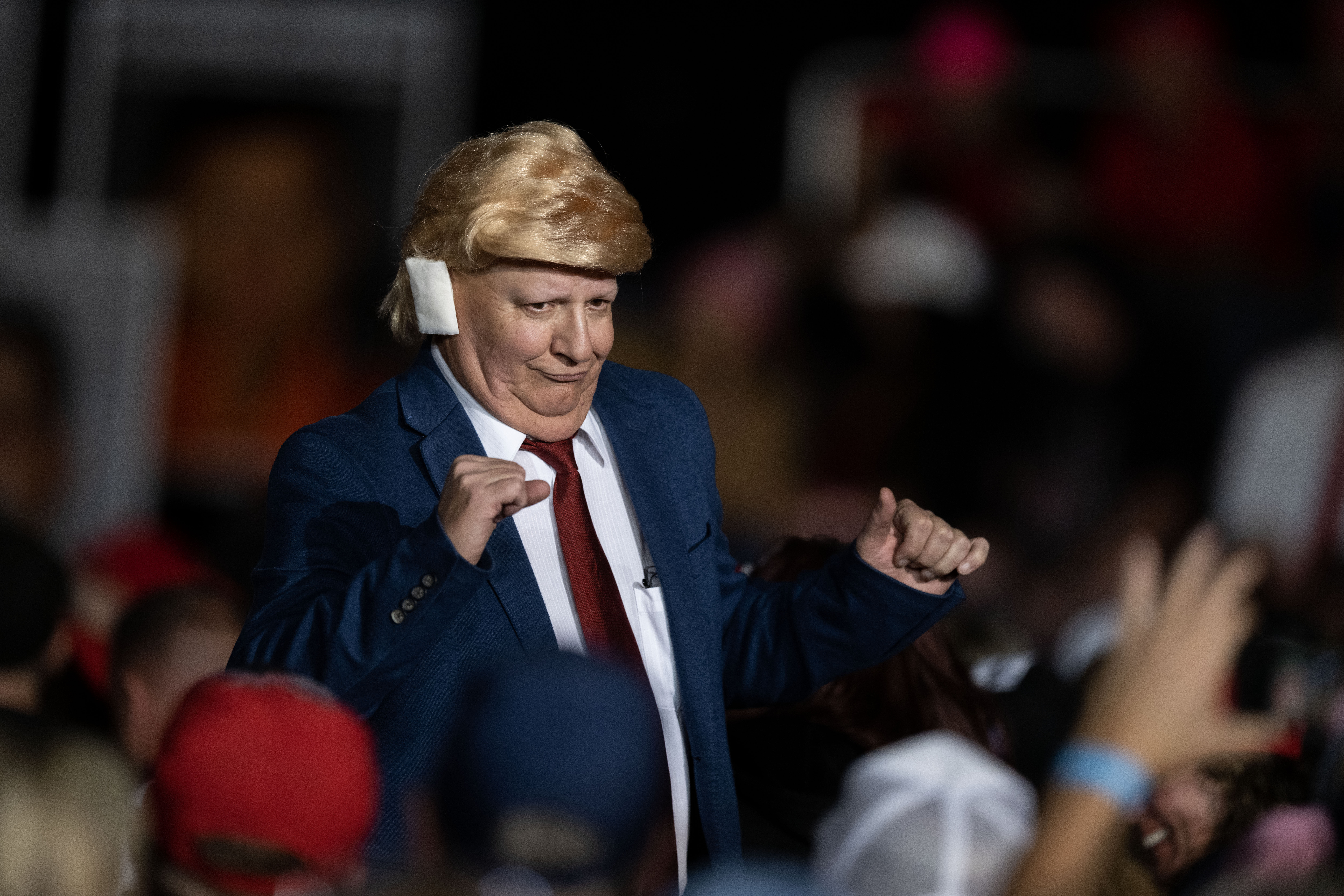 A trump impersonator makes his way through the crowd during a trump rally at the Gaylord Rockies Resort and Convention Center in Aurora on Friday, Oct. 11, 2024. (Stephen Swofford, Denver Gazette) (Stephen Swofford Denver Gazette)