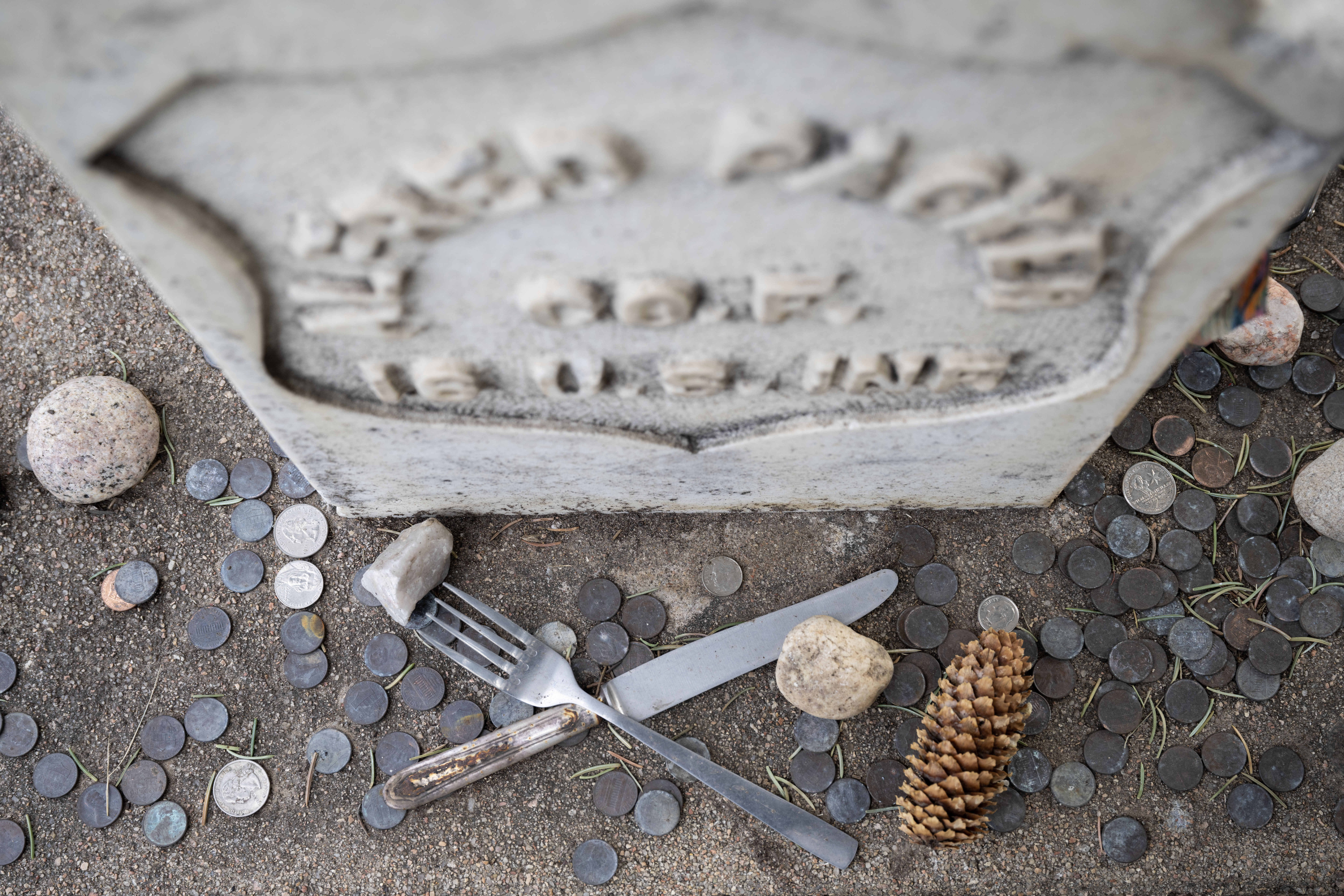 Alfred Packer is the only man in US History to be convicted of a crime related to Cannibalism. His headstone lies in the Littleton Cemetery, where people leave coins and trinkets such as silverware, painted stones, and occasionally chicken bones. (Stephen Swofford, Denver Gazette) (Stephen Swofford Denver Gazette)