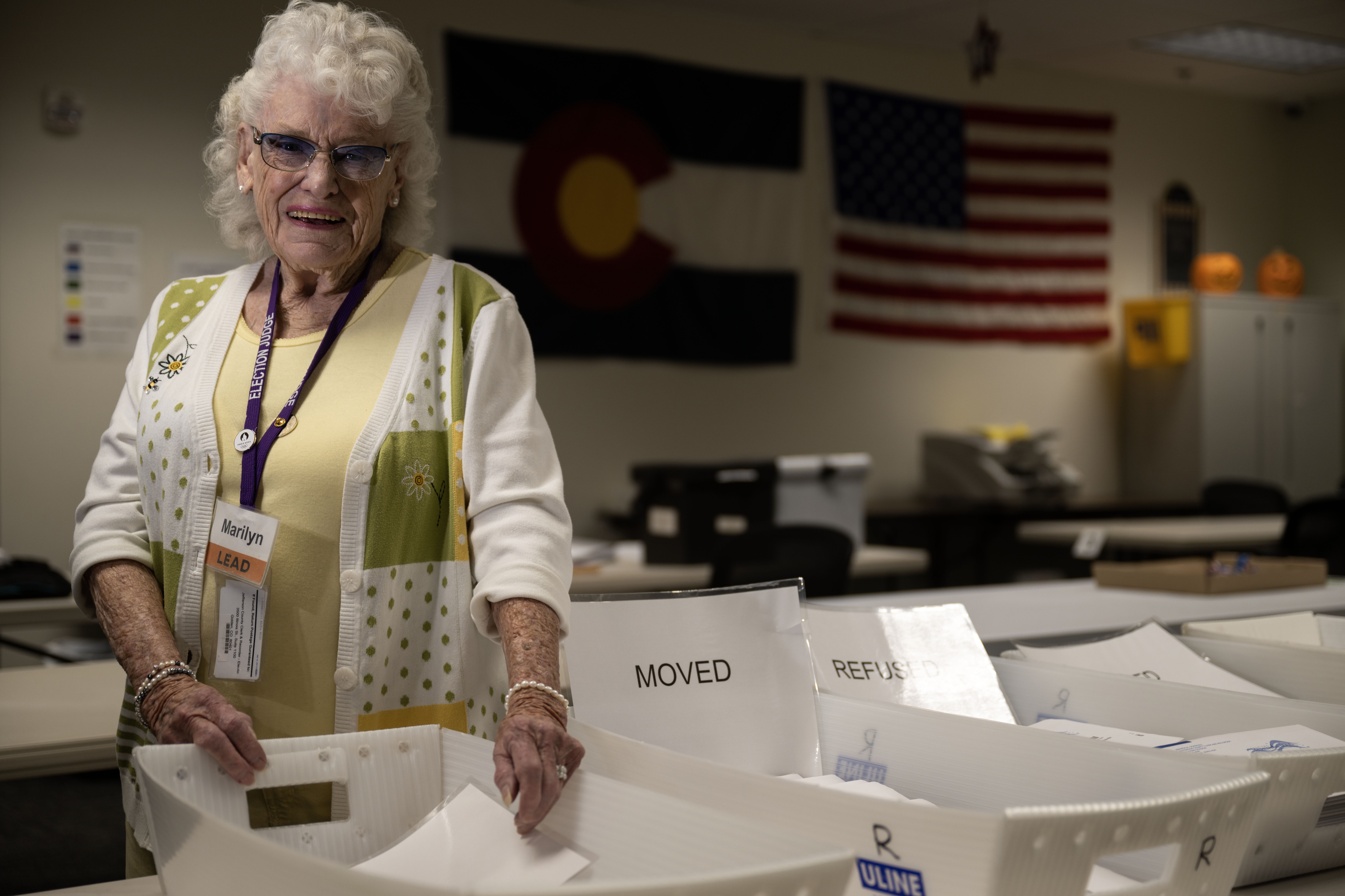Marilyn Whisenand, 90-year old election judge in Jefferson County, stands for a portrait in the Jefferson County Election office in Golden on Thursday, Oct. 10, 2024. (Stephen Swofford, Denver Gazette) (Stephen Swofford Denver Gazette)