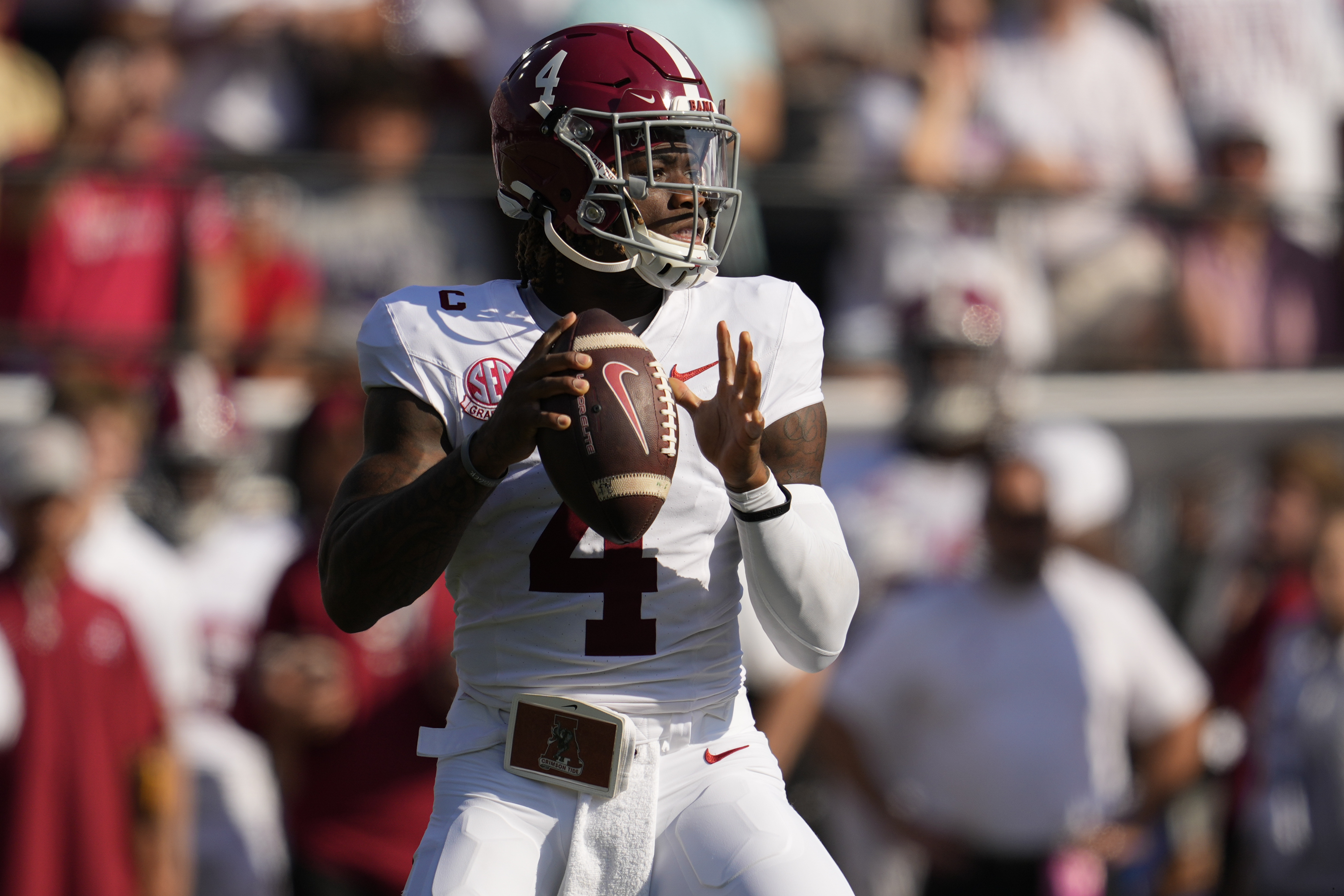 Alabama quarterback Jalen Milroe (4) looks to throw a pass during the first half of an NCAA college football game against Vanderbilt, Saturday, Oct. 5, 2024, in Nashville, Tenn. (AP Photo/George Walker IV) (George Walker IV)