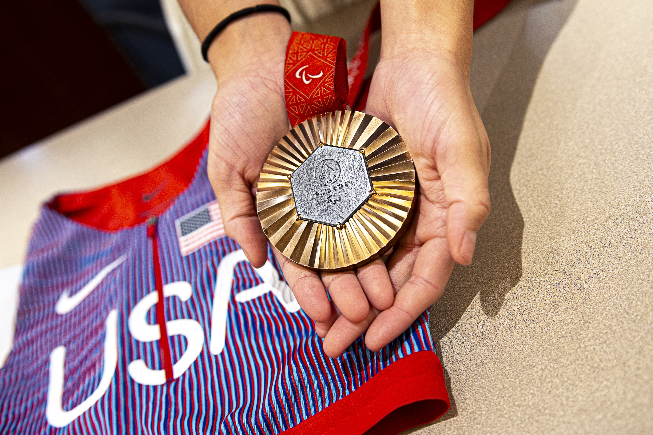 Paralympic bronze medalist Beatriz Hatz shows off her medal from the 2024 Paralympic Summer Games in Paris while posing Lakewood City Council Chambers on Monday, Oct. 28, 2024. The hometown hero was honored with a mayoral proclamation naming a day for her in honor of her many athletic accomplishments. (DeborahSmithGeneral Assignment Reporterdeborah.smith@denvergazette.comhttps://denvergazette.com/content/tncms/avatars/5/cb/928/5cb9281a-1916-11ef-a934-ff8eced4f17d.8e406ef28428e7c4f743743e38d7aa35.png)