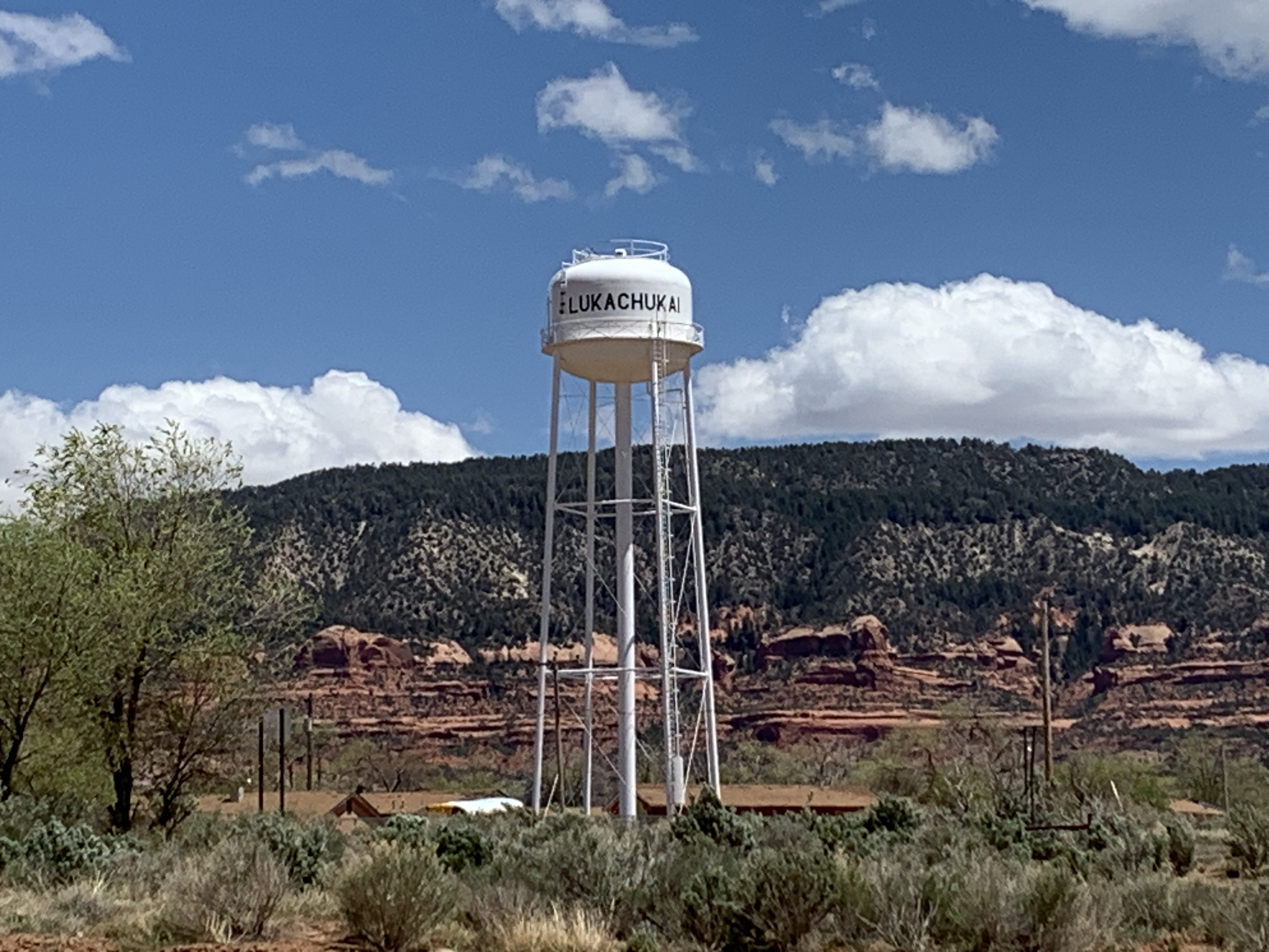 This photo shows a water tower located in the Lukachukai Chapter of the Navajo Nation, Arizona. The Lukachukai Mountains are seen in the background of the photo. (Courtesy of the Environmental Protection Agency)