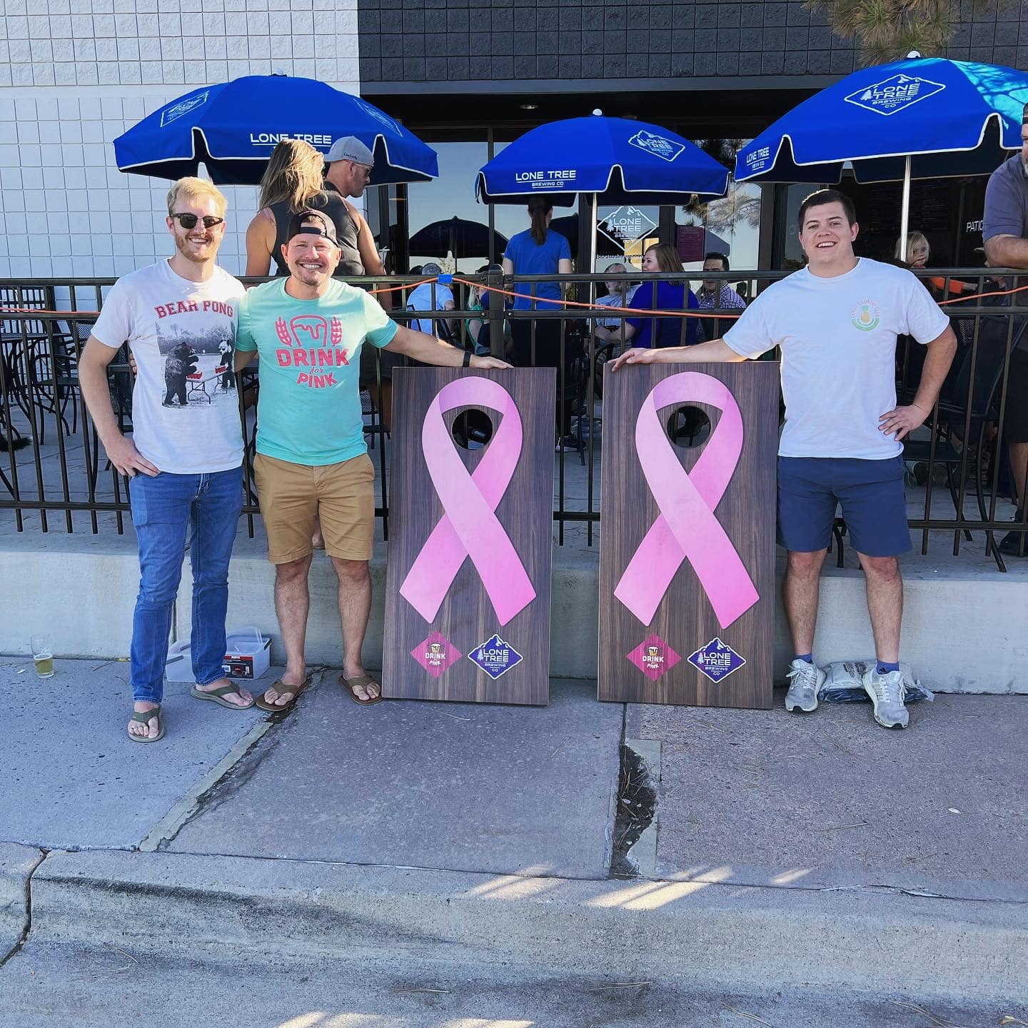 Winners of a Drink for Pink cornhole tournament fundraiser at Lone Tree Brewing Co. in this undated photo. (Courtesy photo, Alex Mozota)