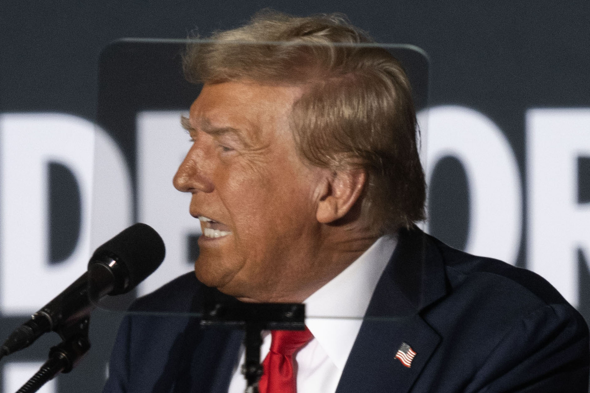 Trump is seen through a teleprompter screen as he addresses the crowd during a political rally at the Gaylord Rockies Resort and Convention Center in Aurora on Friday, Oct. 11, 2024. (Stephen Swofford, Denver Gazette) (Stephen Swofford Denver Gazette)