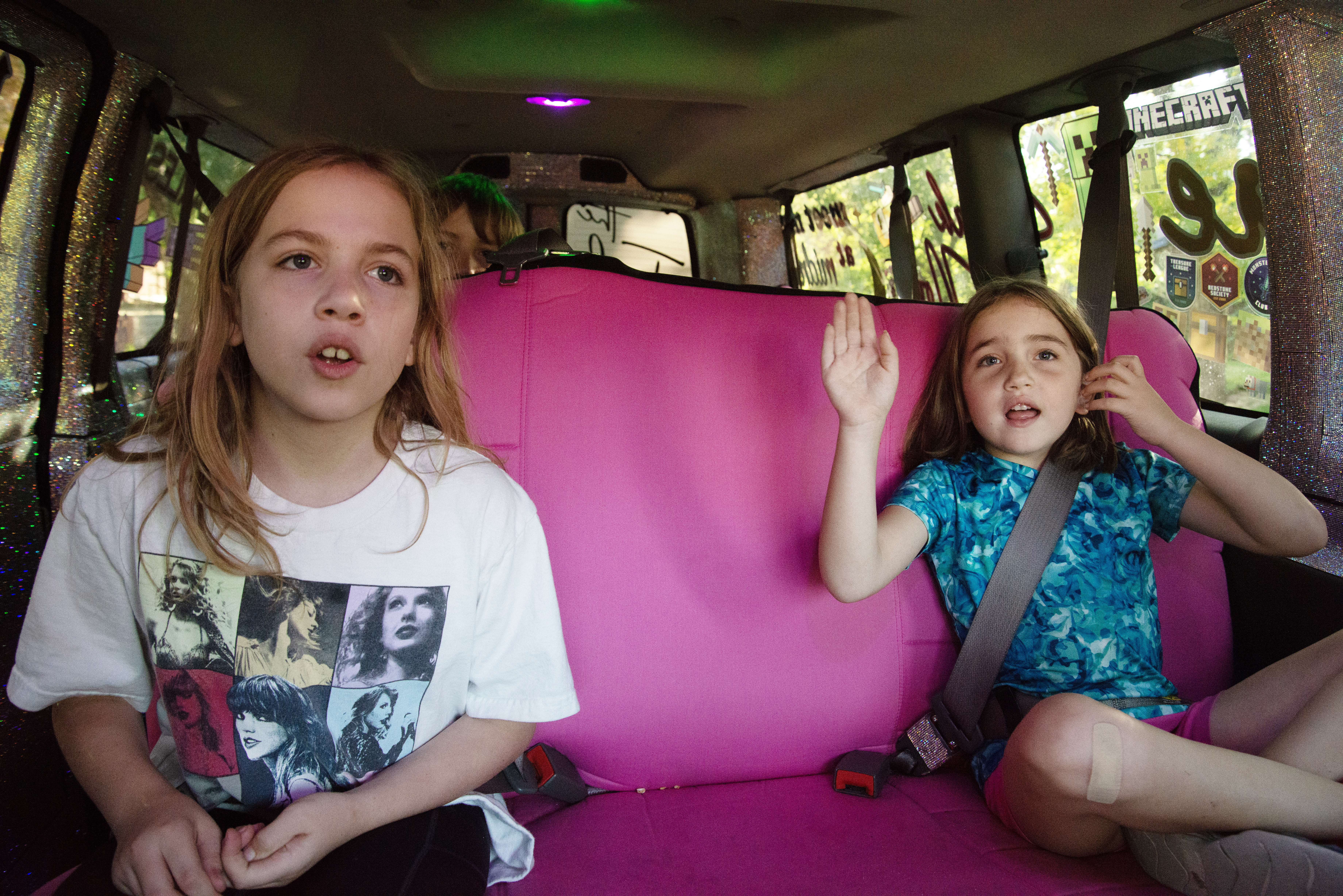 Shiloh, left, RJ, back center, and Violet Fleming go for a ride in