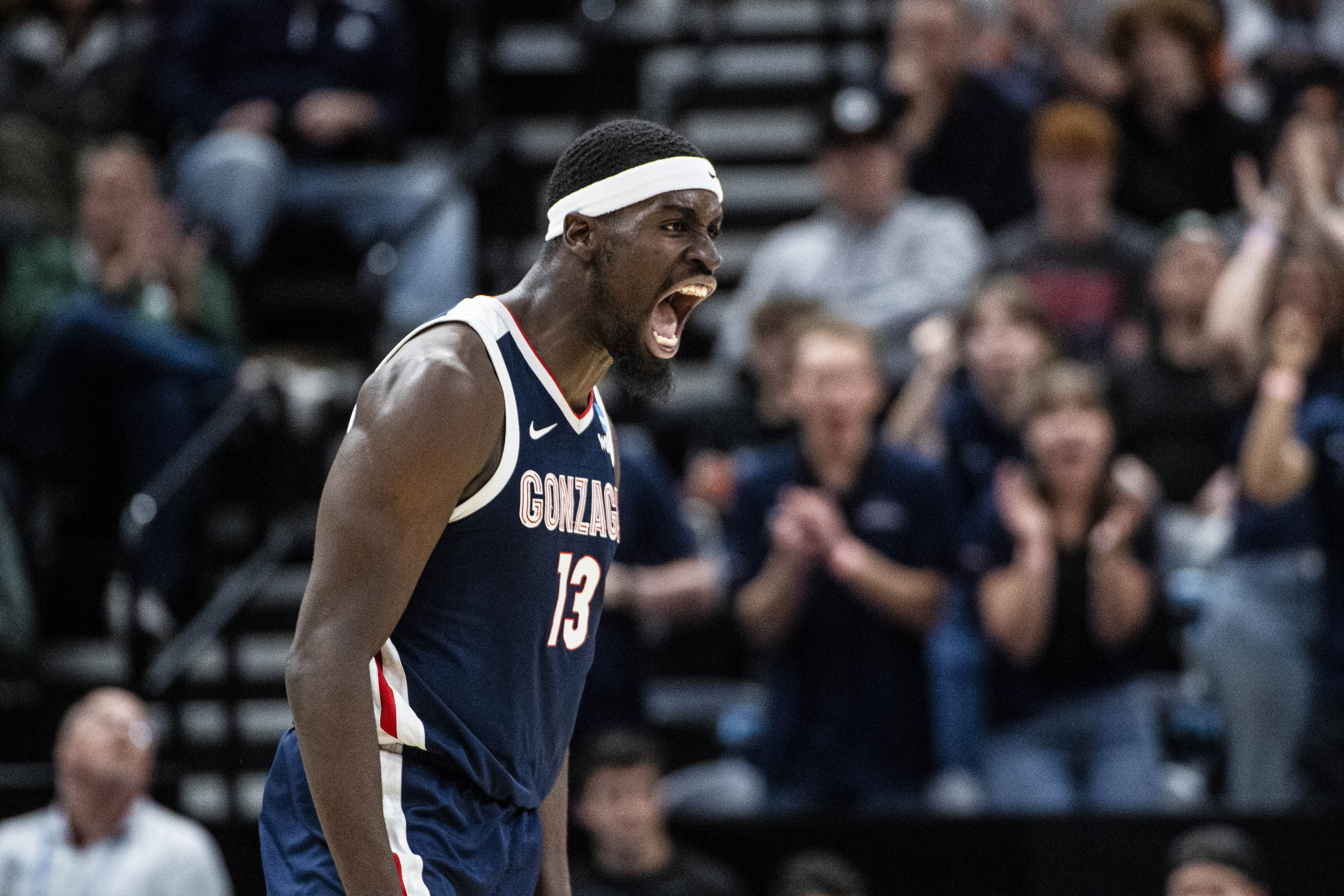 Gonzaga forward Graham Ike (13) cheers as a timeout is called during the second half of a second-round college basketball game against Kansas in the NCAA Tournament in Salt Lake City, Saturday, March 23, 2024. (AP Photo/Isaac Hale) (Isaac Hale)