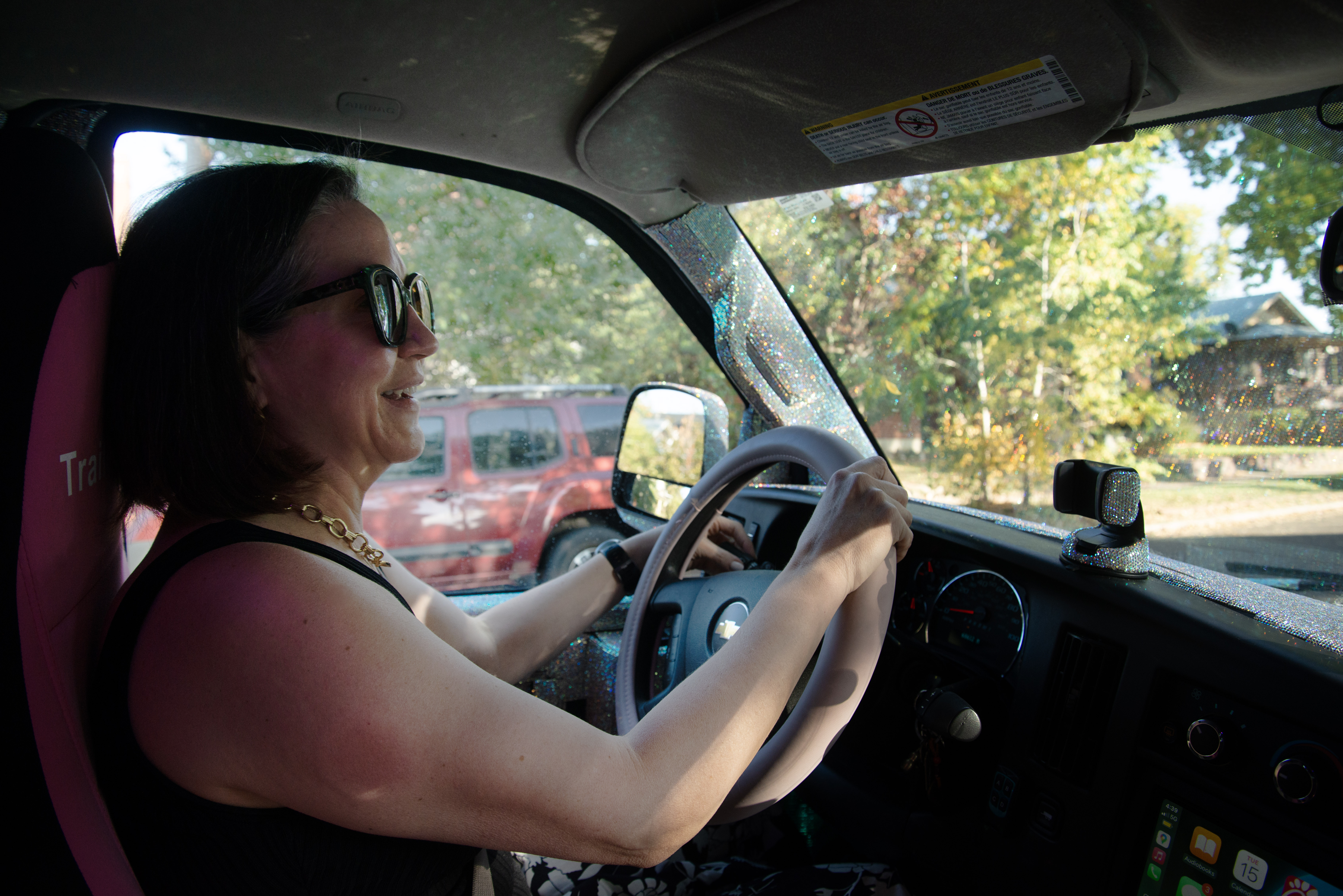 Mary-Katherine Fleming of Denver drives her kids around in