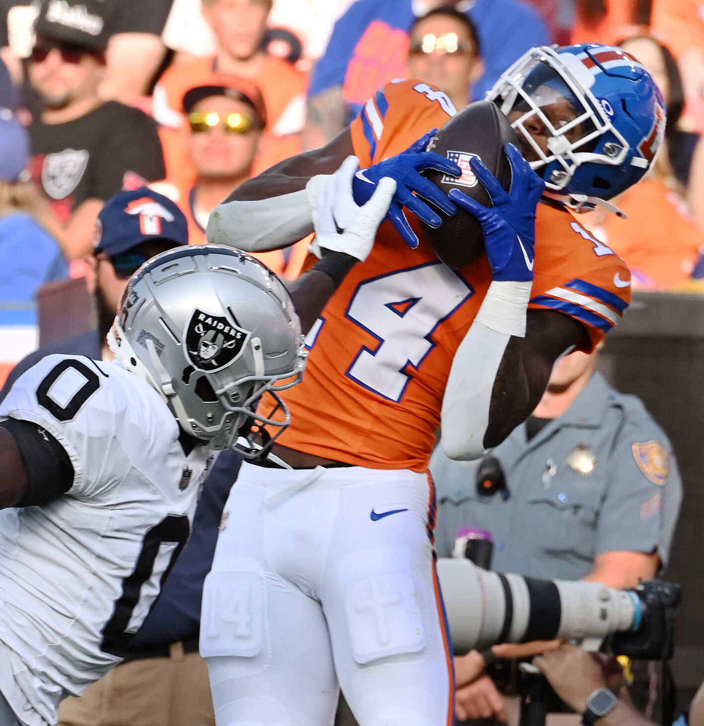 Denver Broncos wide receiver Courtland Sutton (14) pulls in a catch during the fourth quarter of a game at Empower Field at Mile High on Sunday, Oct. 6, 2024. The Broncos won the game 34-18. (Jerilee Bennett The Gazette)
