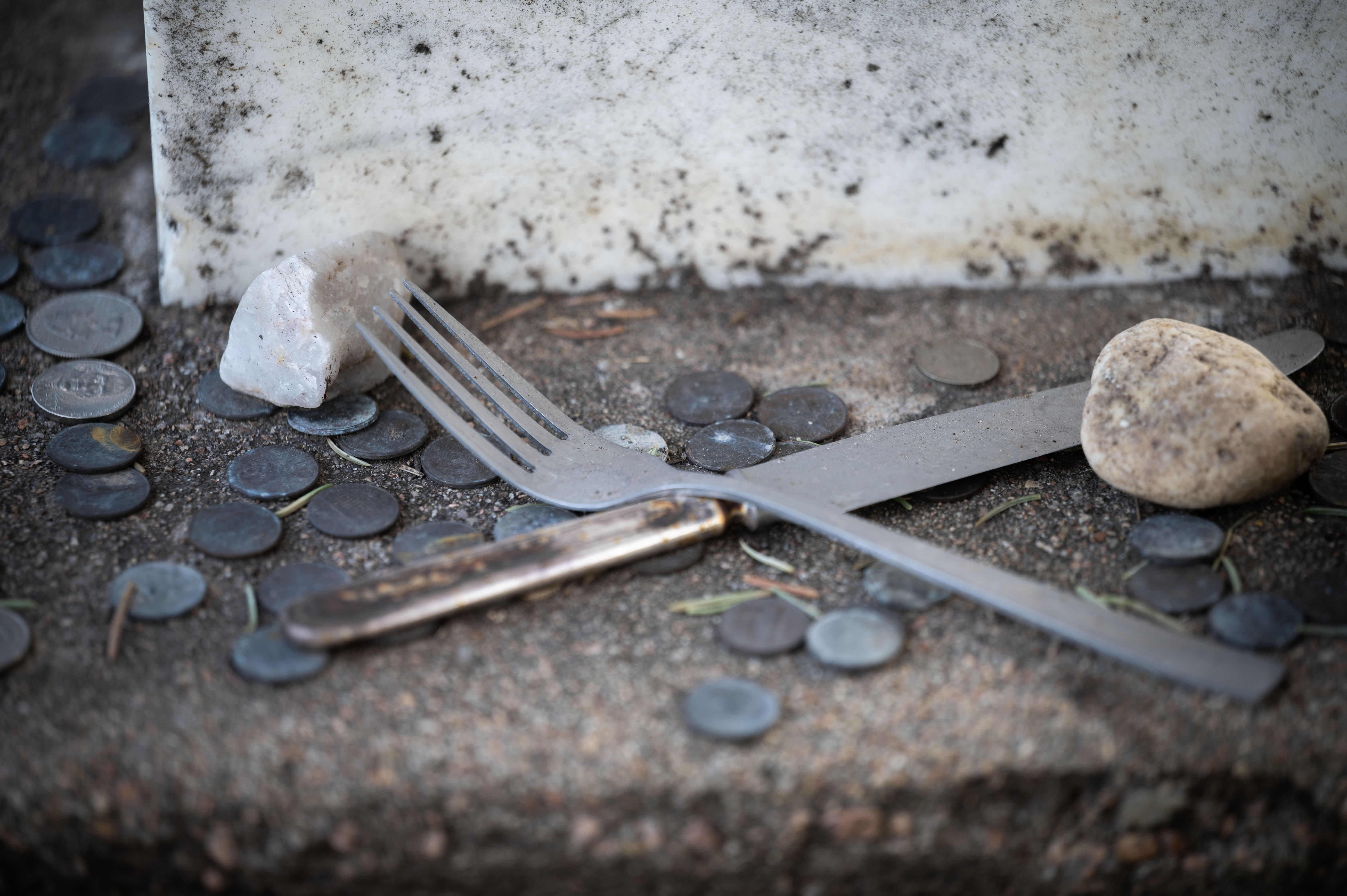 Alfred Packer is the only man in US History to be convicted of a crime related to Cannibalism. His headstone lies in the Littleton Cemetery, where people leave coins and trinkets such as silverware, painted stones, and occasionally chicken bones. (Stephen Swofford, Denver Gazette) (Stephen Swofford Denver Gazette)