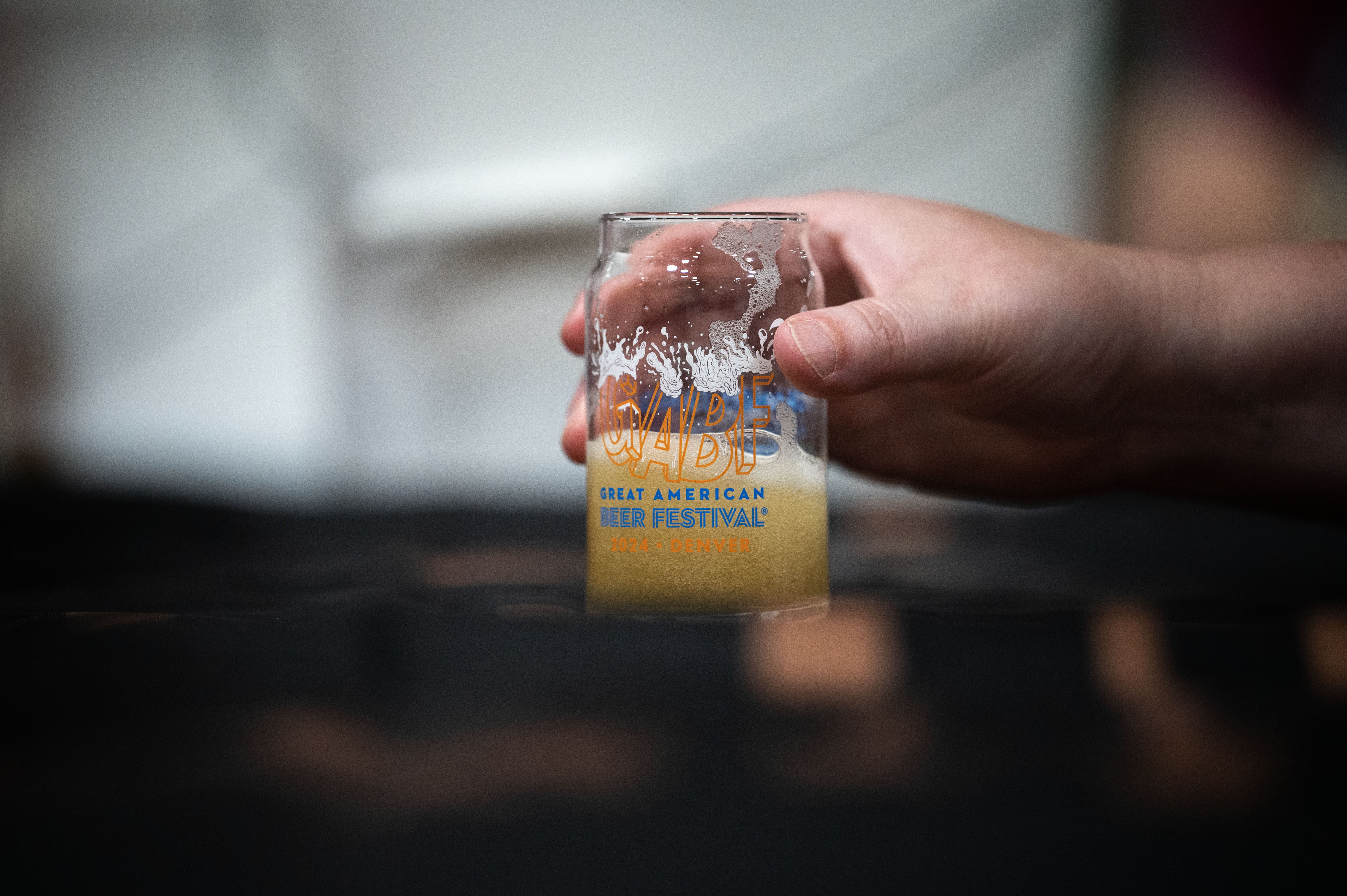 People drink beer samples on the opening night of the Great American Beer Festival on Thursday, Oct. 10, 2024 (Stephen Swofford, Denver Gazette) (Stephen Swofford Denver Gazette)