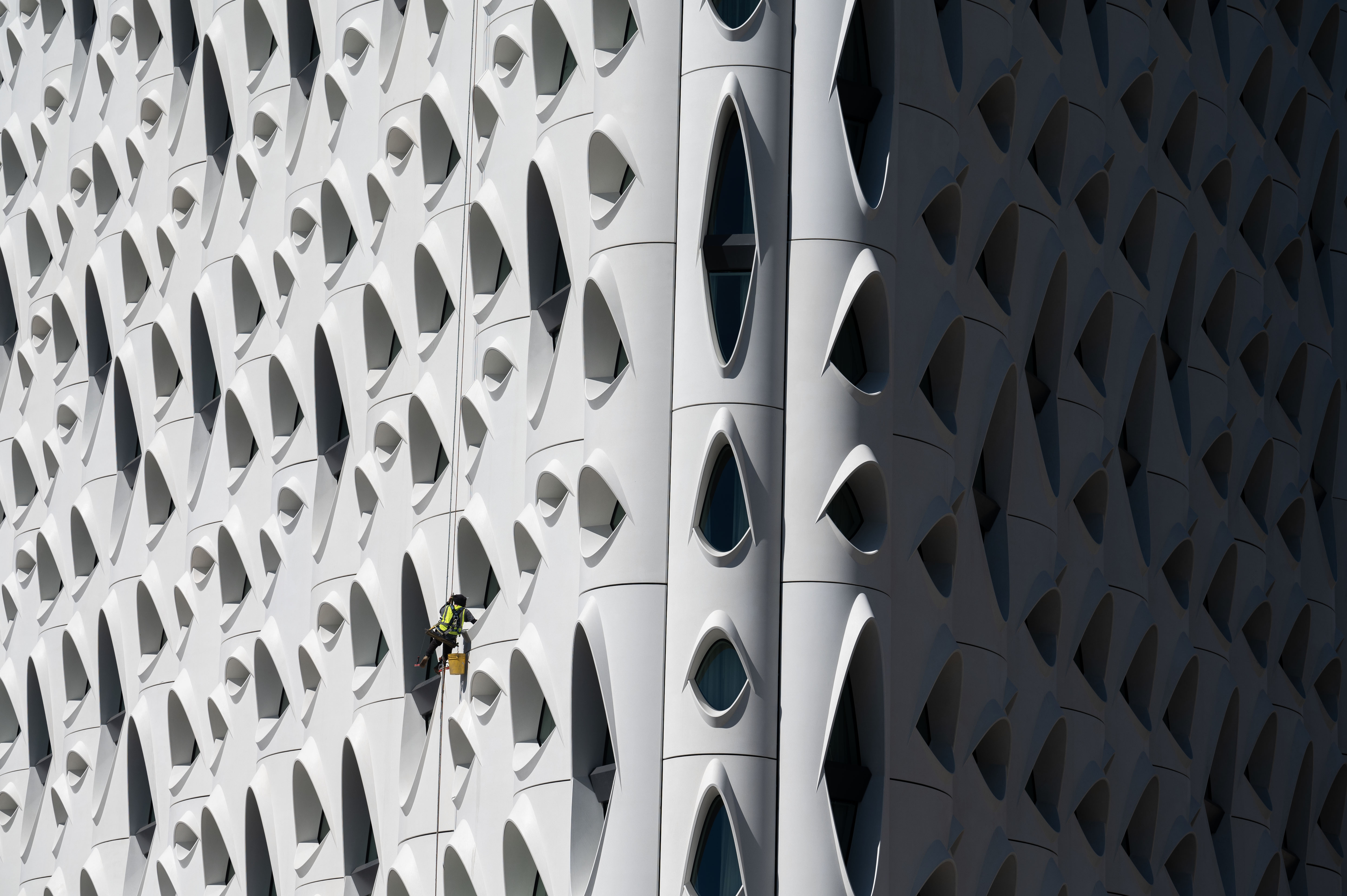 A window washer cleans the outside of the Populous Hotel on Wednesday, Oct. 2, 2024. The hotel plans to open to the public on October 15. (Stephen Swofford, Denver Gazette) (StephenSwoffordPhotographerstephen.swofford@gazette.comhttps://secure.gravatar.com/avatar/1ddcaf11c5d70eaa58546ddc4e038687?d=mm&r=g)