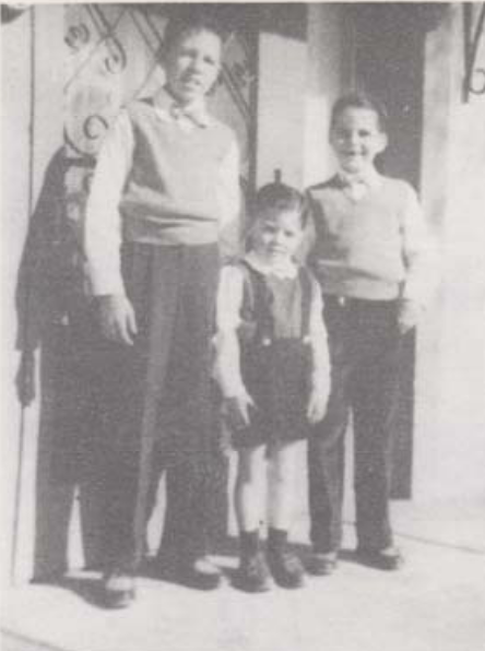 Robert Mathews, center, was 3 when this photo was taken with brothers Grant, 11, and Lee, 7, on the porch of the family home in Marfa, Texas. “Bob’s parents didn't raise him to hate,” Kevin Flynn said. “In fact, they encouraged him to learn more about the world.