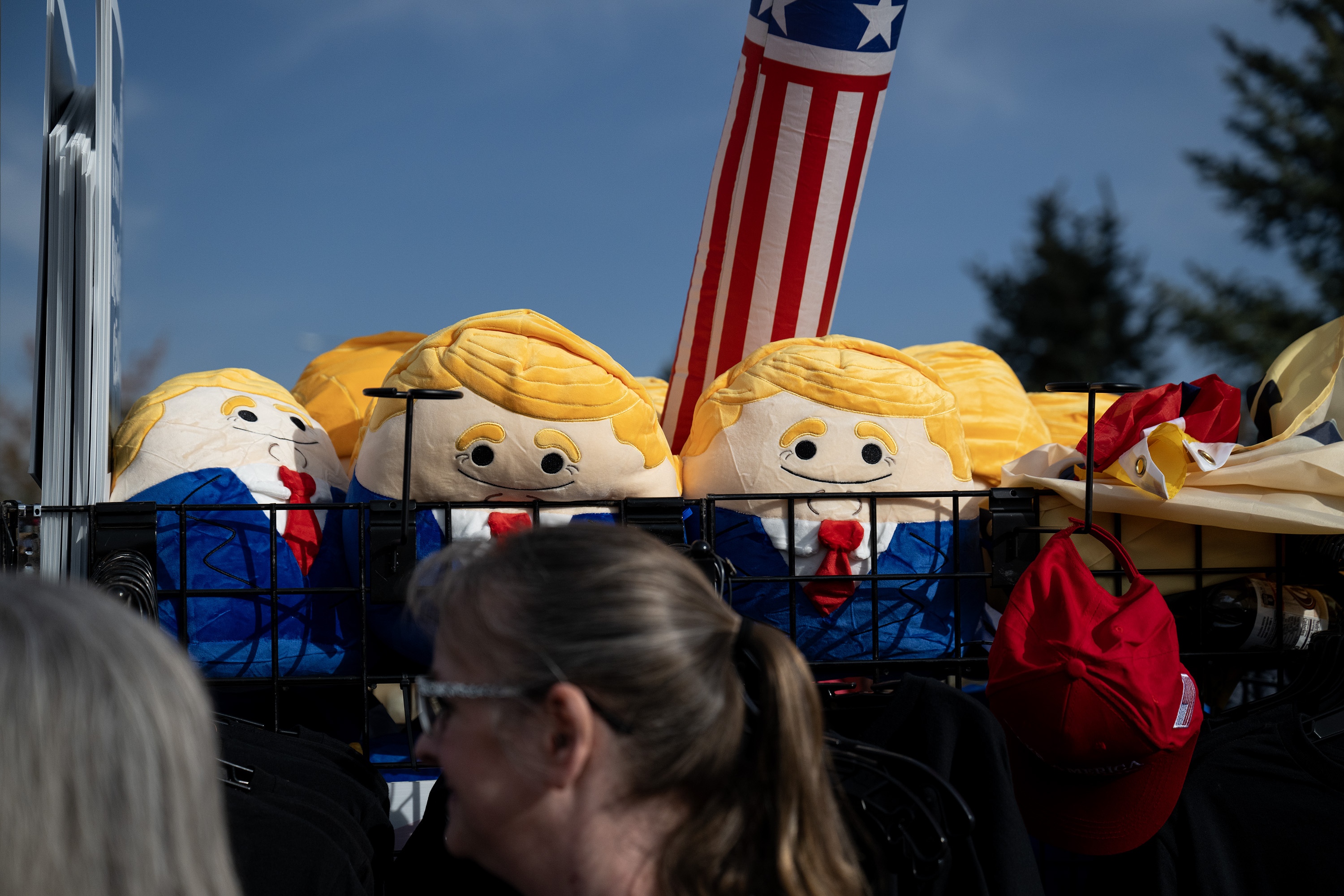 Stuffed cartoon Trump characters for sale outside of a Trump campaign rally at the Gaylord Rockies Resort and Convention Center, Friday, Oct. 11, 2024, in Aurora, Colo. (Parker Seibold, The Gazette) (Parker Seibold, The Gazette)
