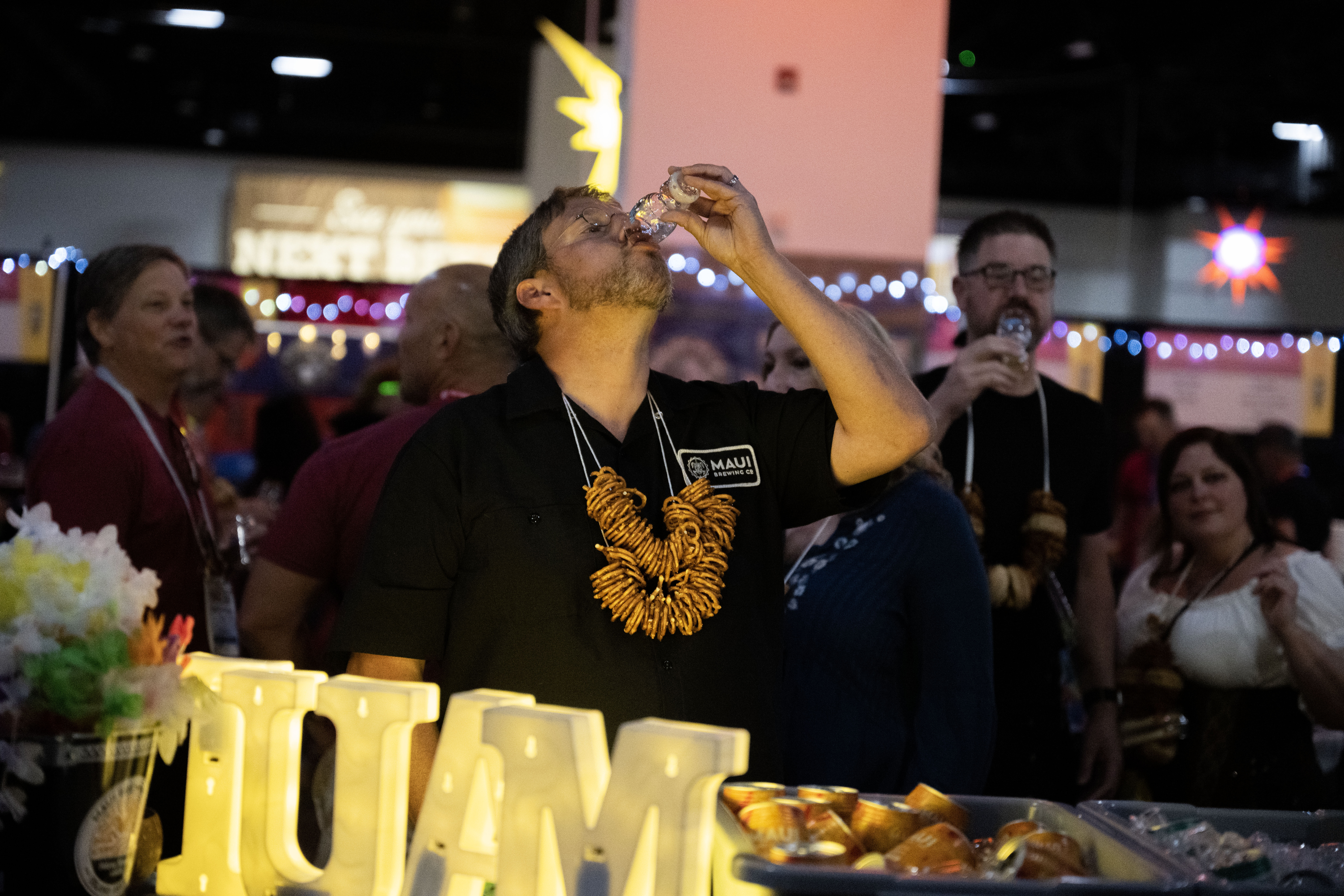 Erik Jasper tastes a sample from Maui Brewing on the opening night of the Great American Beer Festival on Thursday, Oct. 10, 2024 (Stephen Swofford, Denver Gazette) (Stephen Swofford Denver Gazette)