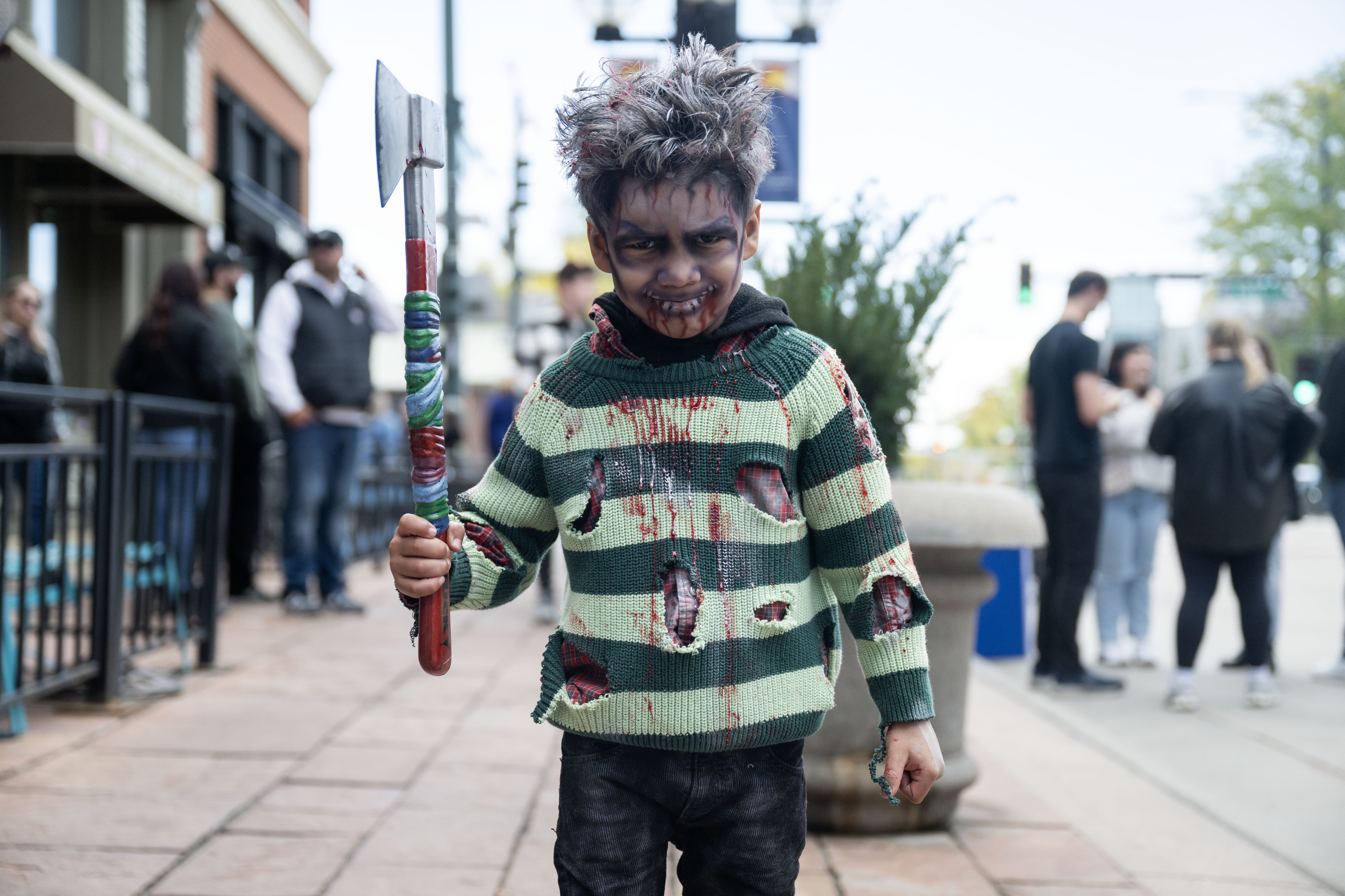 Huascar Polanco, 5, poses for a photo as he and his family walk through Larimer Square during the Denver Zombie Crawl on Saturday, Oct. 19, 2024. (Stephen Swofford, Denver Gazette) (StephenSwoffordPhotographerstephen.swofford@gazette.comhttps://secure.gravatar.com/avatar/1ddcaf11c5d70eaa58546ddc4e038687?d=mm&r=g)