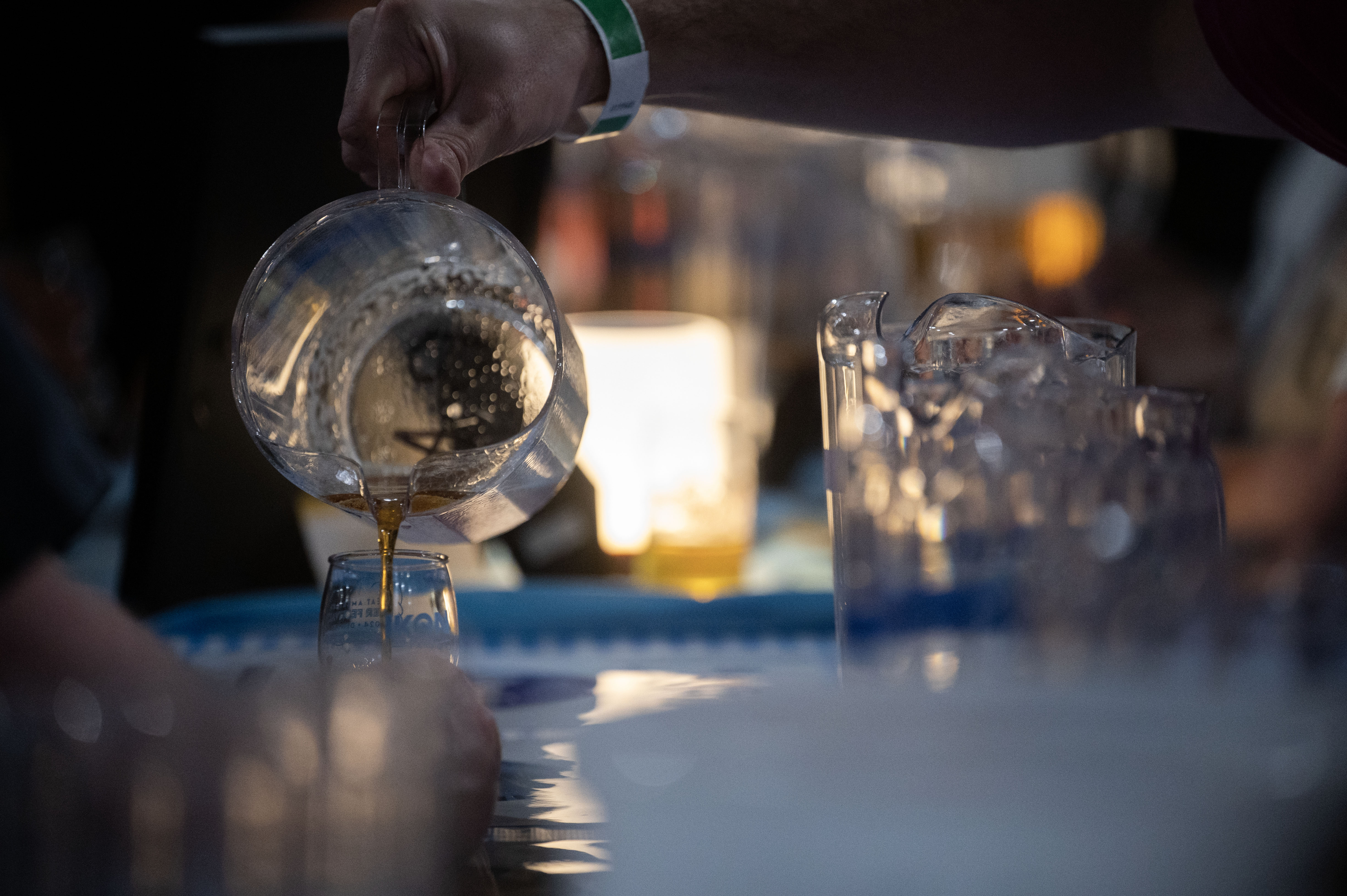A brewmaster pours a sample on the opening night of the Great American Beer Festival on Thursday, Oct. 10, 2024 (Stephen Swofford, Denver Gazette) (Stephen Swofford Denver Gazette)