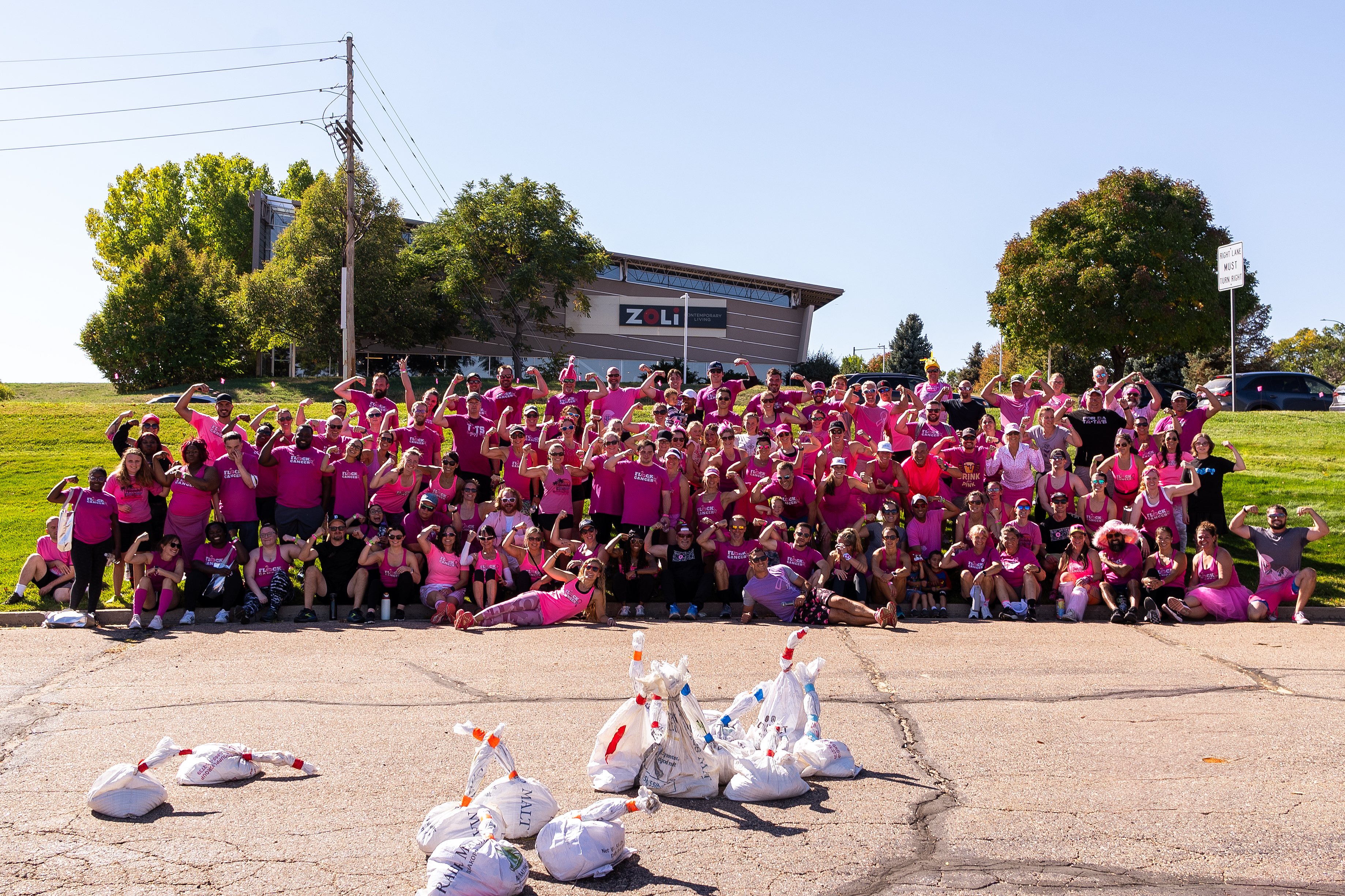 More than 150 participants of the Brewery Boot Camp for Breast Cancer 2024 in Centennial pose after working out on Oct. 5, 2024. (Courtesy photo, Sunfire Photos)