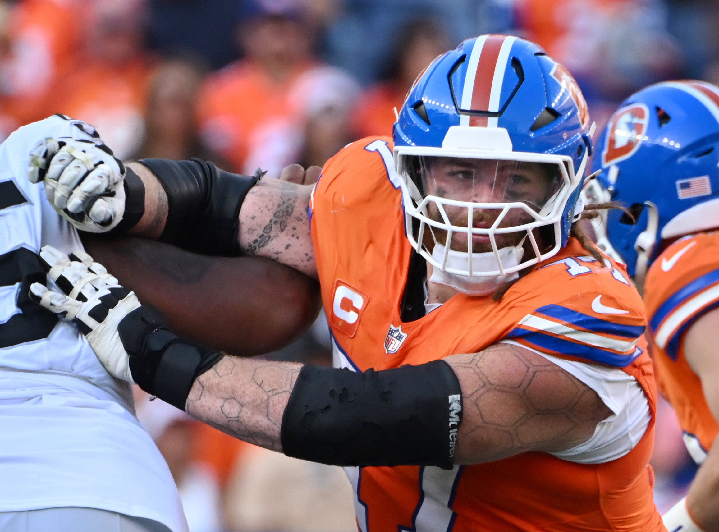Denver Broncos guard Quinn Meinerz (77) participates in a play during a game against the Raiders at Empower Field at Mile High on Sunday, Oct. 6, 2024. (Jerilee Bennett The Gazette)